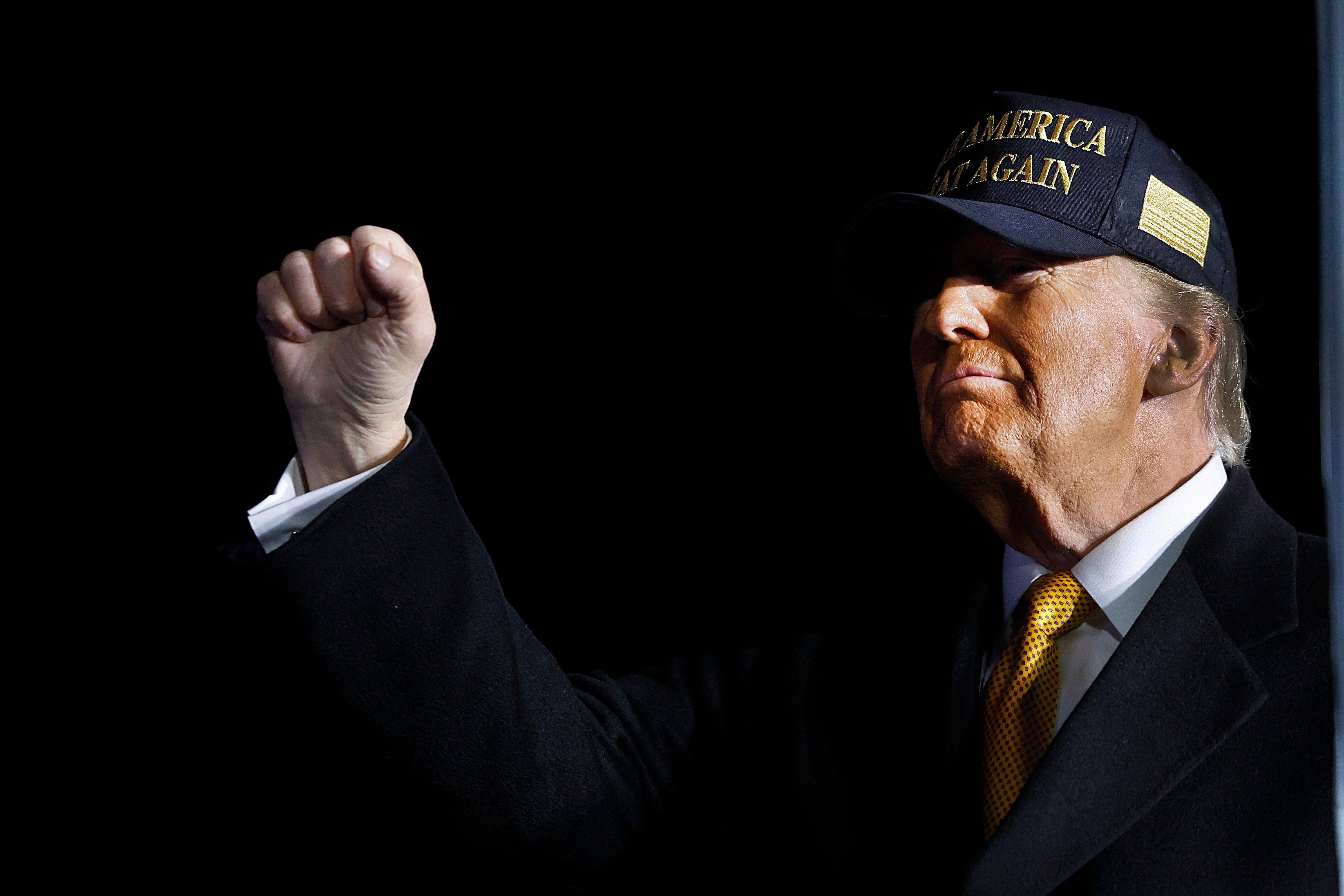 Former resident Donald Trump leaves a campaign rally at Avflight at Cherry Capital Airport on October 25, 2024, in Traverse City, Michigan. A large amount of the bets coming into one site, picked the Republican to win in November