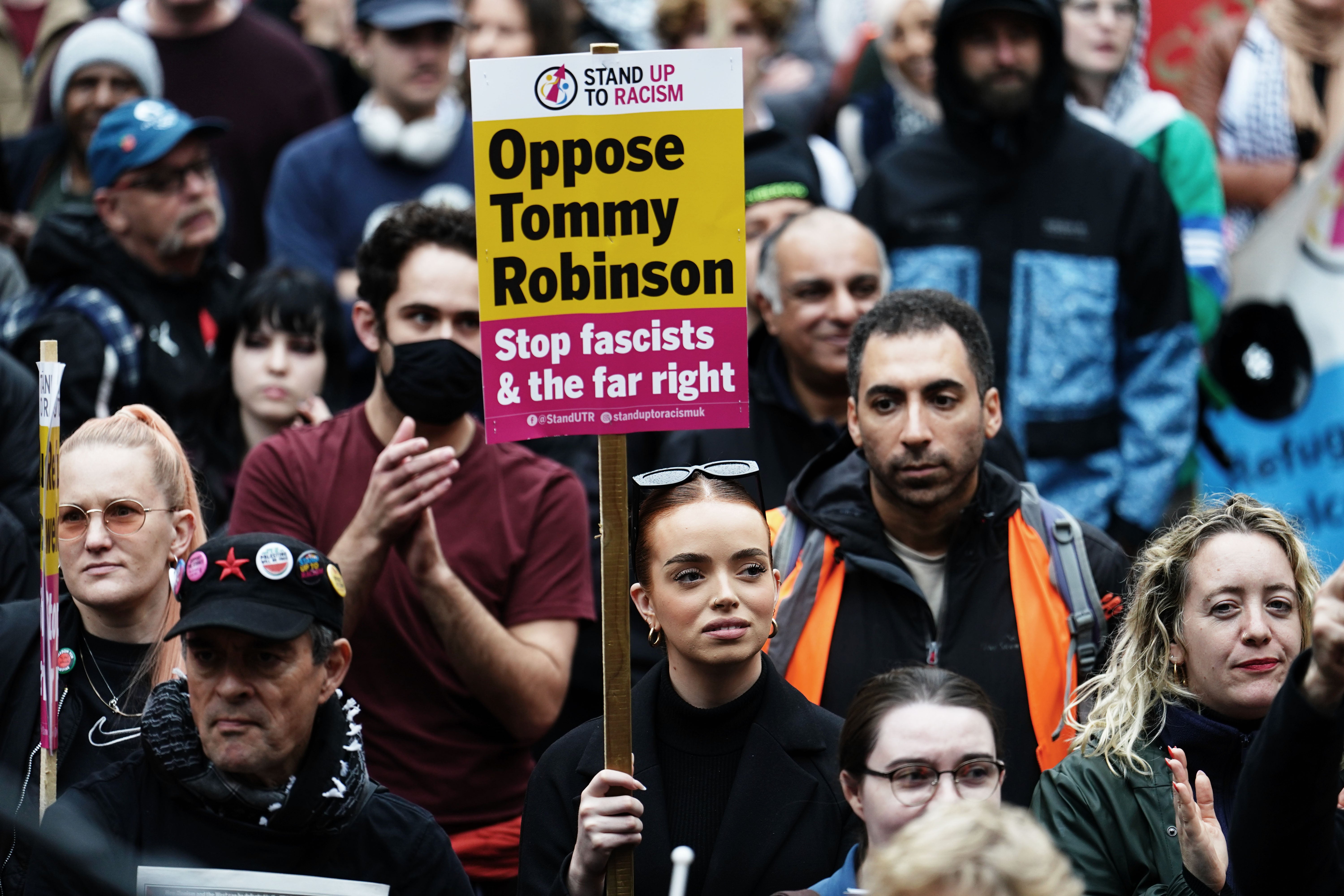 People join civil society groups led by Stand Up To Racism during a counter-protest against a Pro-UK rally endorsed by Tommy Robinson in central London