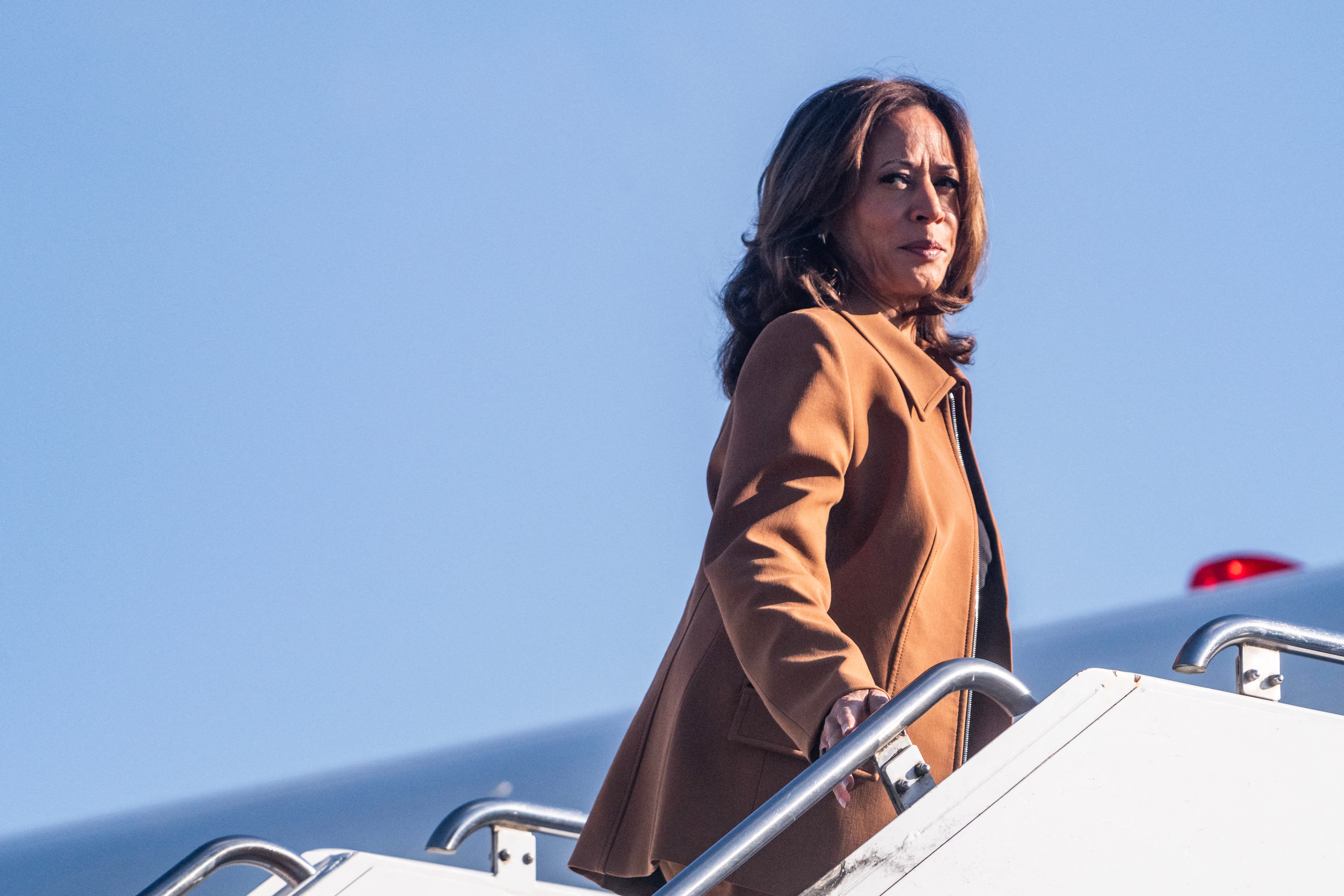 Democratic presidential candidate Kamala Harris boards Air Force Two. The vice president has taken an increasingly dark turn in her rhetoric as she attacks Republican nominee Donald Trump