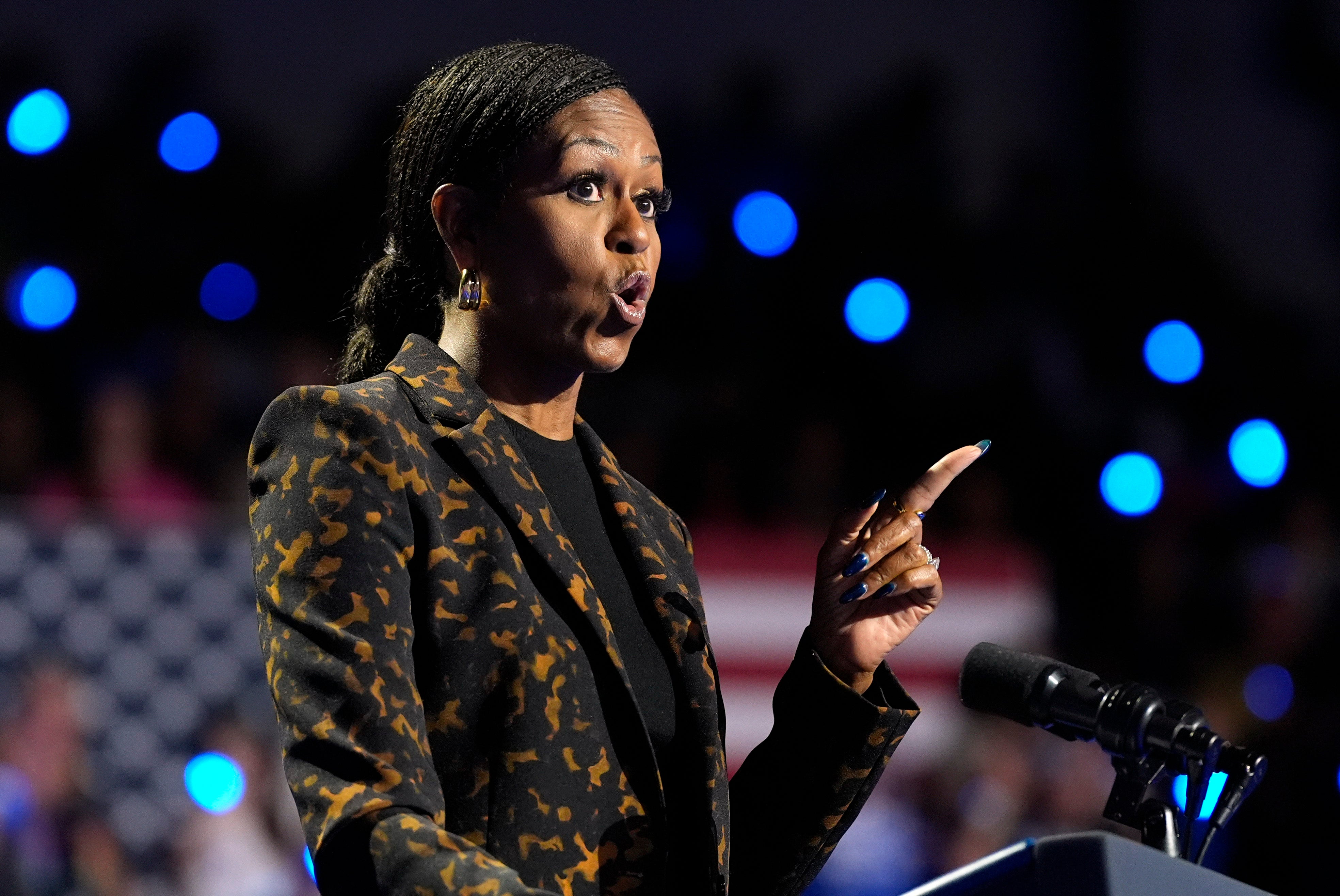 Michelle Obama slammmed ‘predator’ Donald Trump as she delivered a bleak warning for the future of reproductive health at a campaign rally for Kamala Harris in Michigan on October 26.