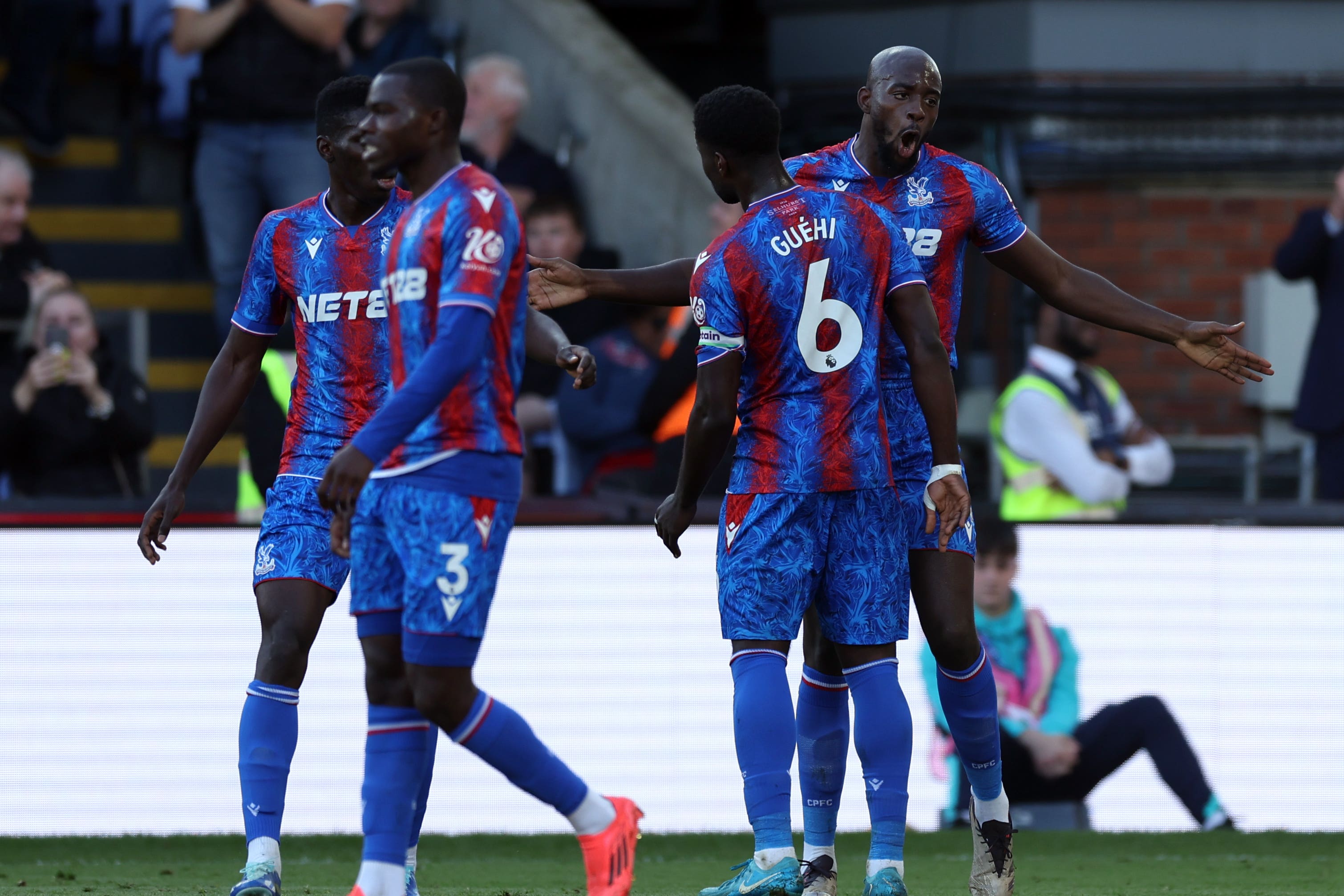 Jean-Philippe Mateta (right) celebrates scoring Palace’s winner (Steven Paston/PA)