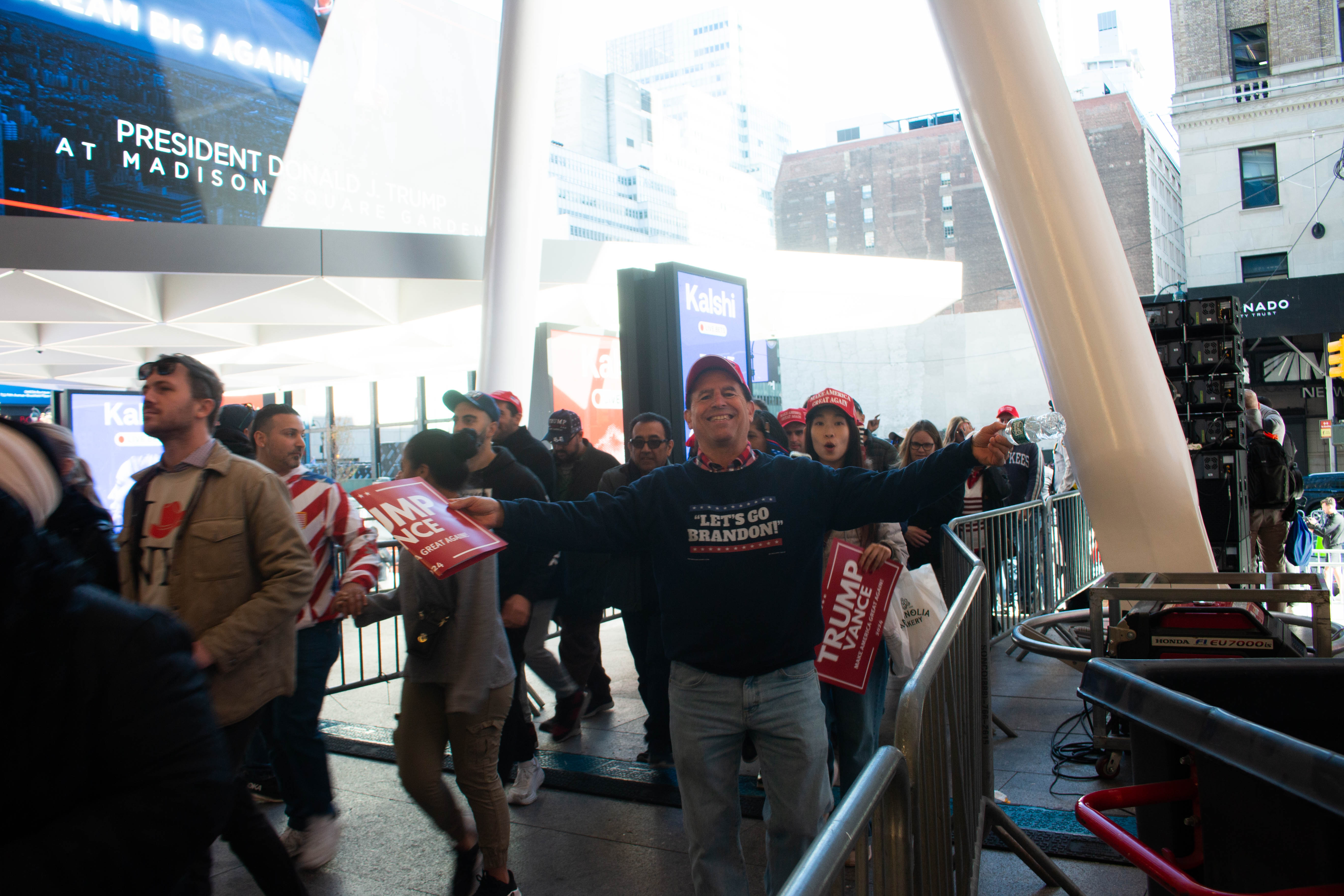 This man, wearing a ‘Let’s Go Brandon!’ pullover was so excited to pose for cameras as he walked into The Garden