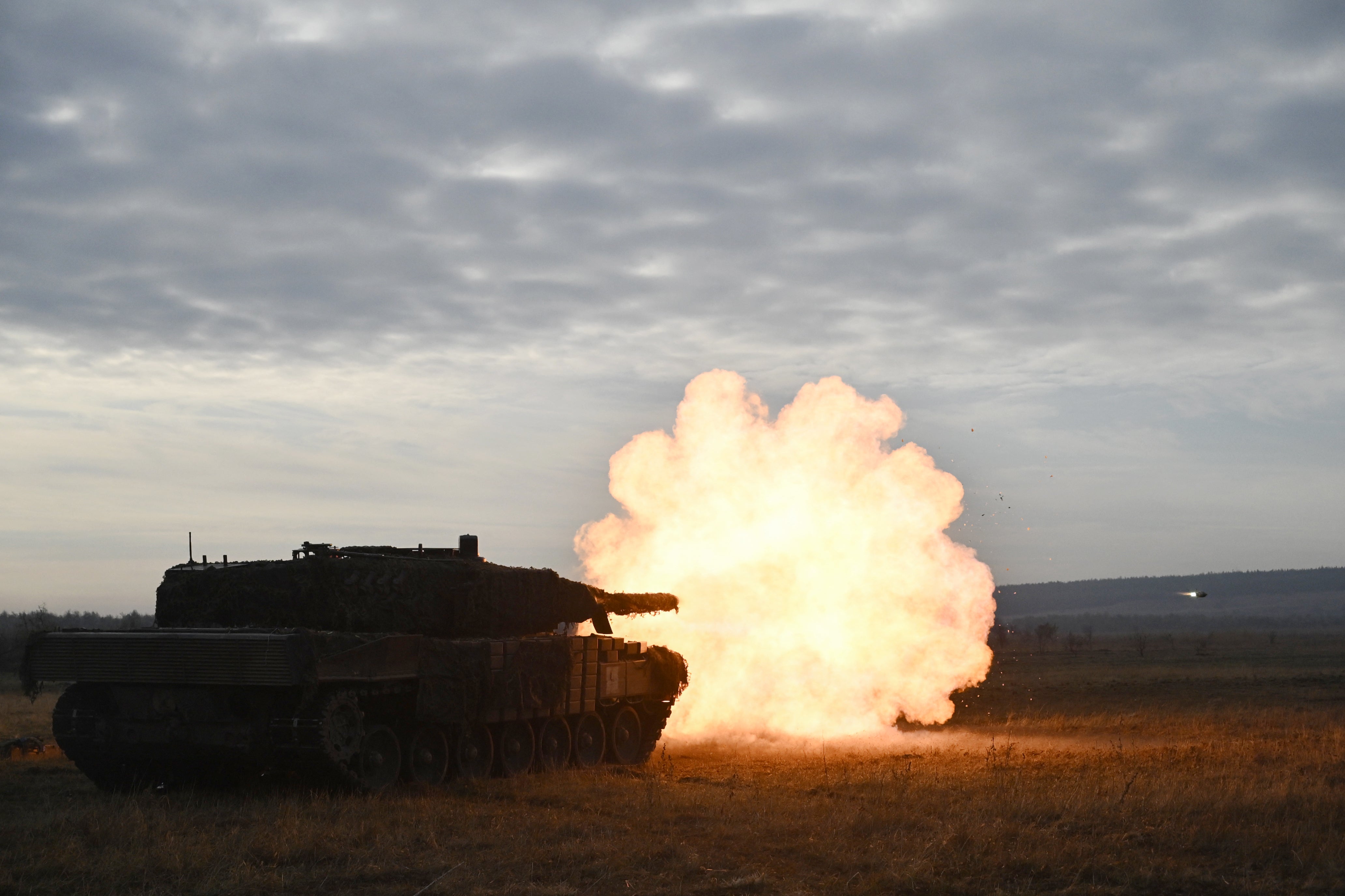 Ukrainian Ground Forces fire with a Leopard 2A4 tank during a field training