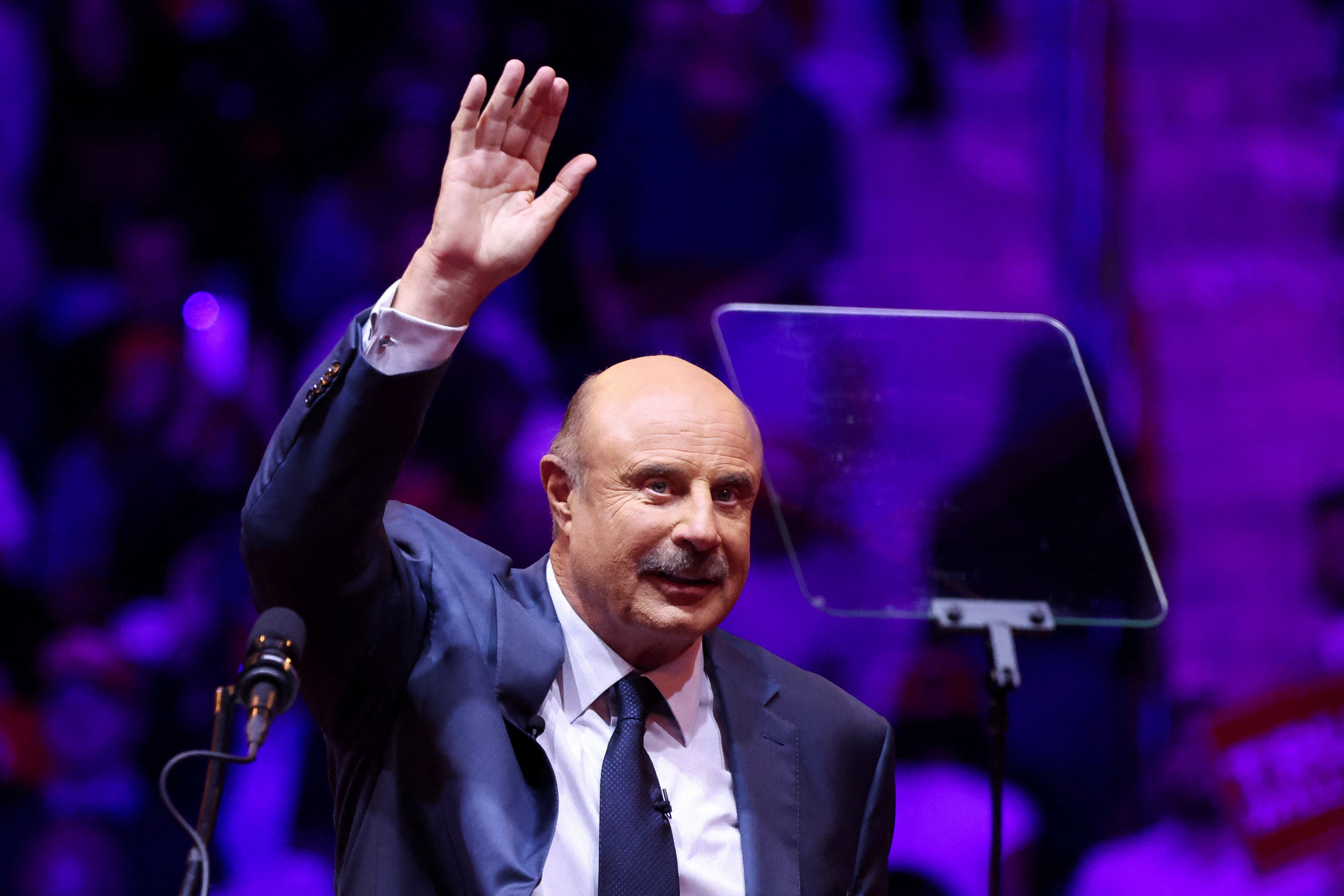 Dr. Phil McGraw waves during a rally for Republican presidential nominee and former U.S. President Donald Trump at Madison Square Garden, in New York