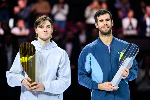 <p>Jack Draper lifts the trophy after beating Karen Khachanov in Vienna</p>