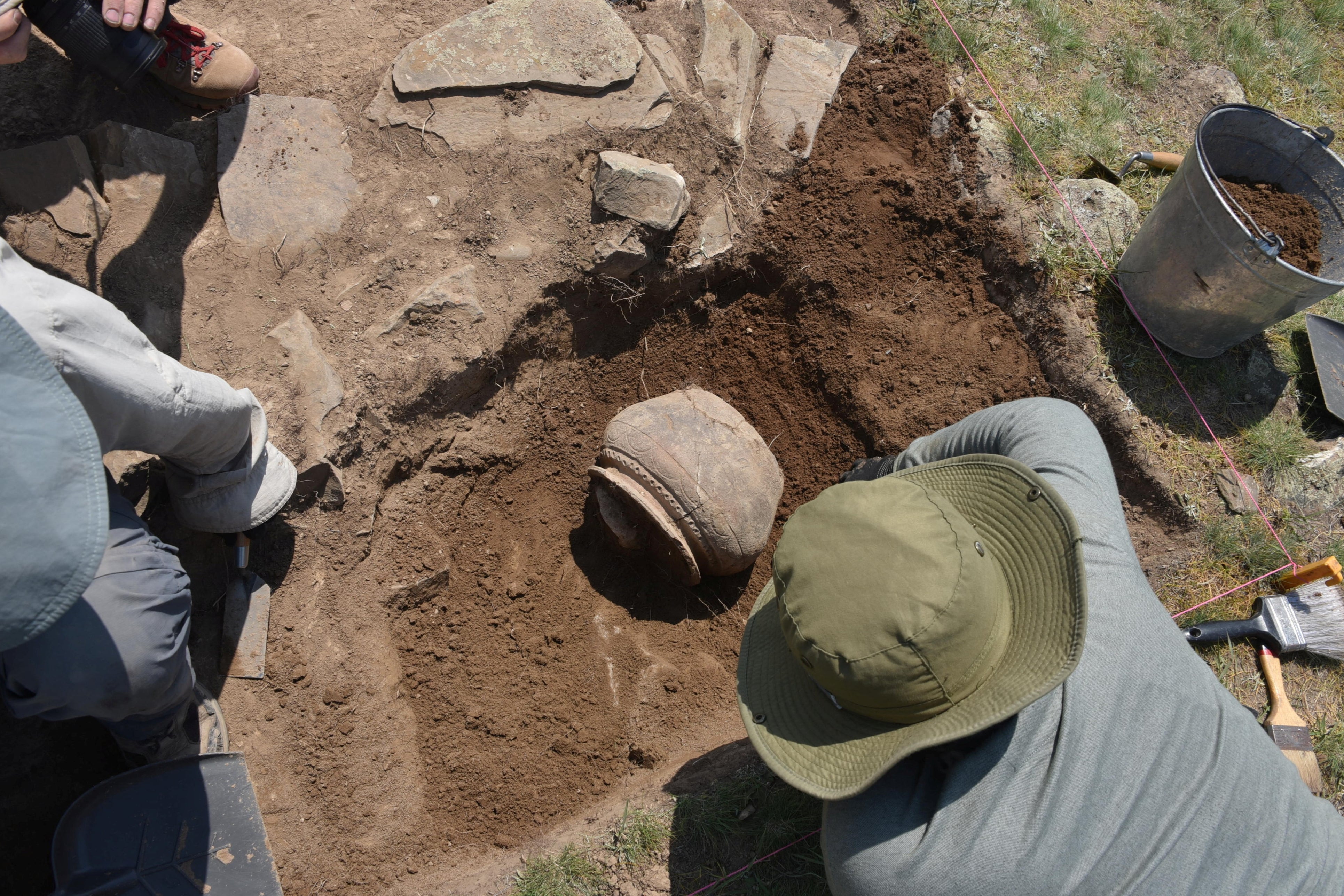 Researchers excavate medieval pottery at the newly rediscovered medieval Silk Road city Tugunbulak in 2022