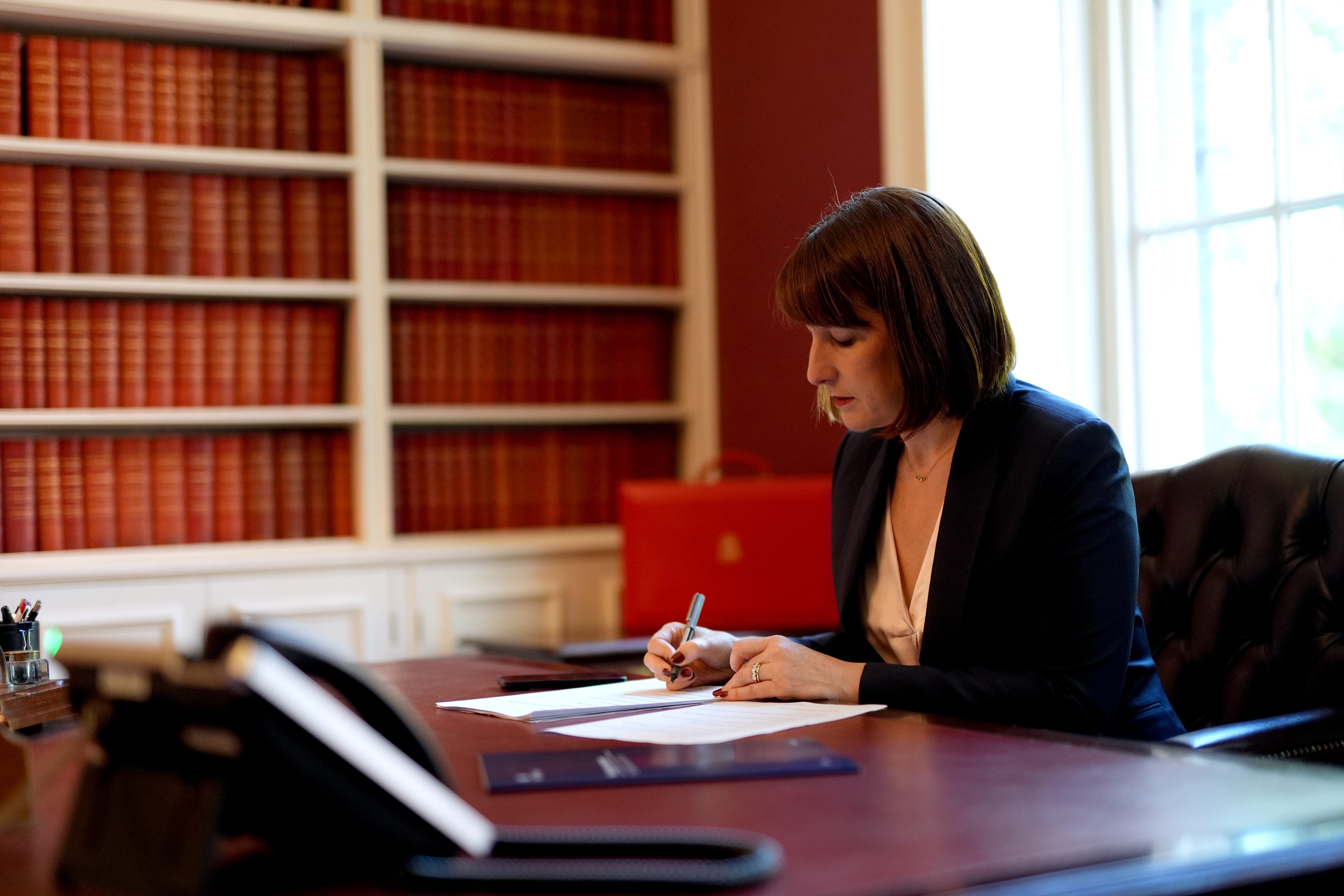 Rachel Reeves in her office (Jordan Pettitt/PA)