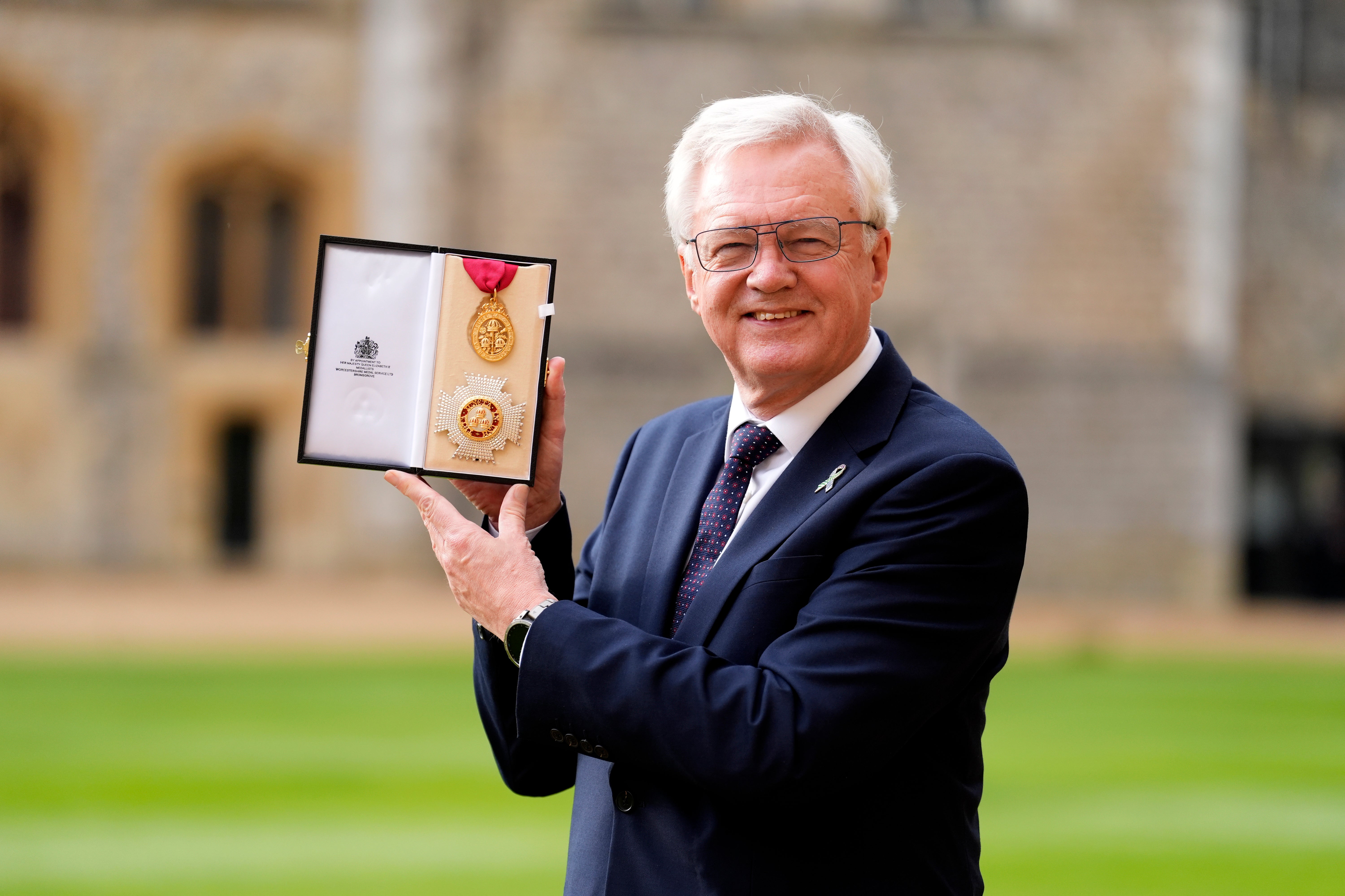 Sir David Davis after being made a Knight Commander of the Order of the Bath by the Princess Royal during an Investiture ceremony at Windsor Castle, Berkshire