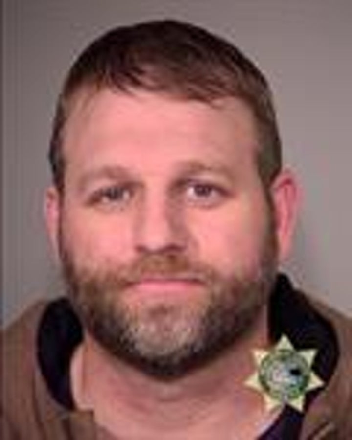 In this handout provided by the Multnomah County Sheriff's Office, suspect Ammon Bundy poses for a mugshot photo after being arrested by U.S. Marshalls January 26, 2016 in Oregon.