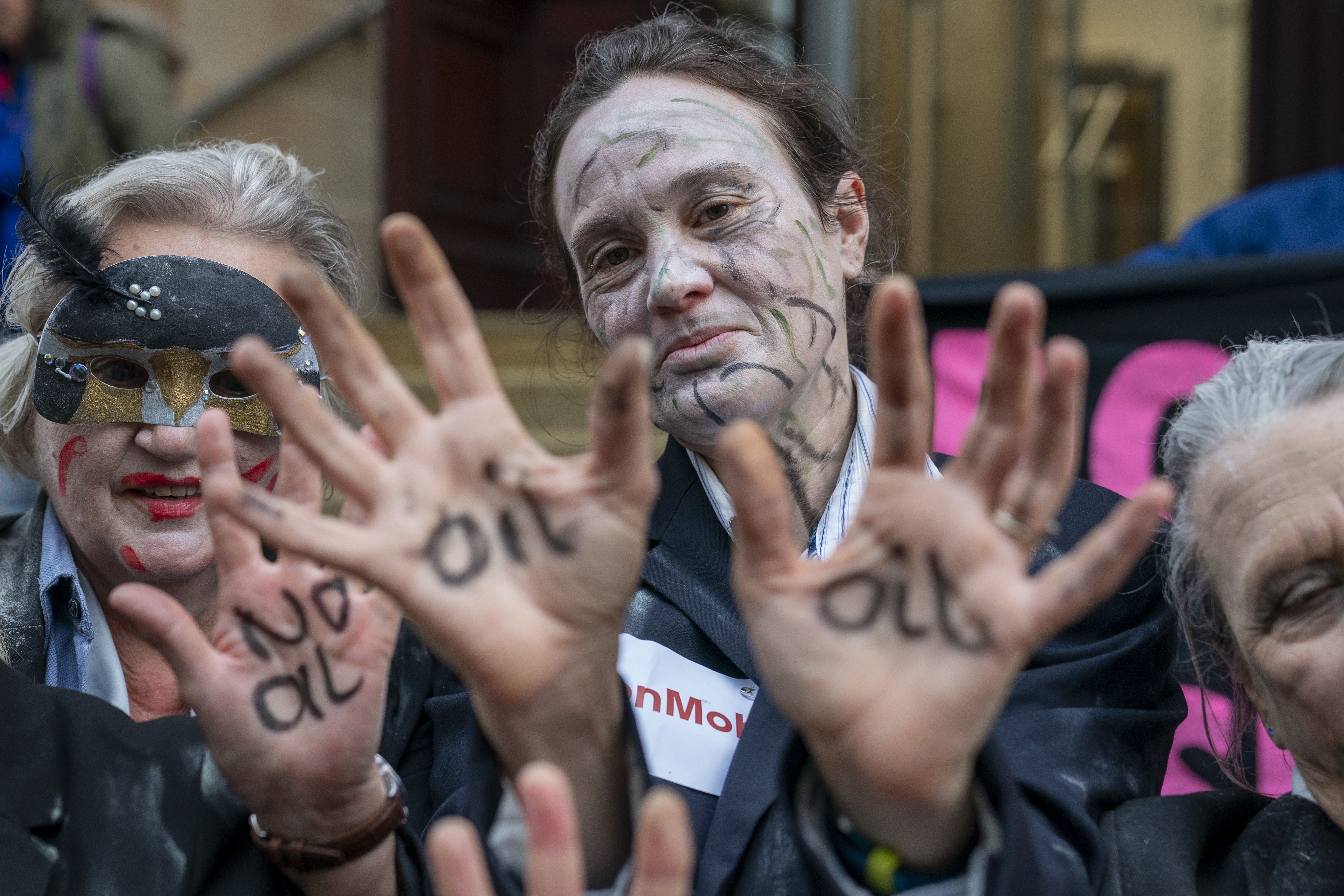 Extinction Rebellion Scotland activists dressed as zombies for a protest on Tuesday (Jane Barlow/PA)