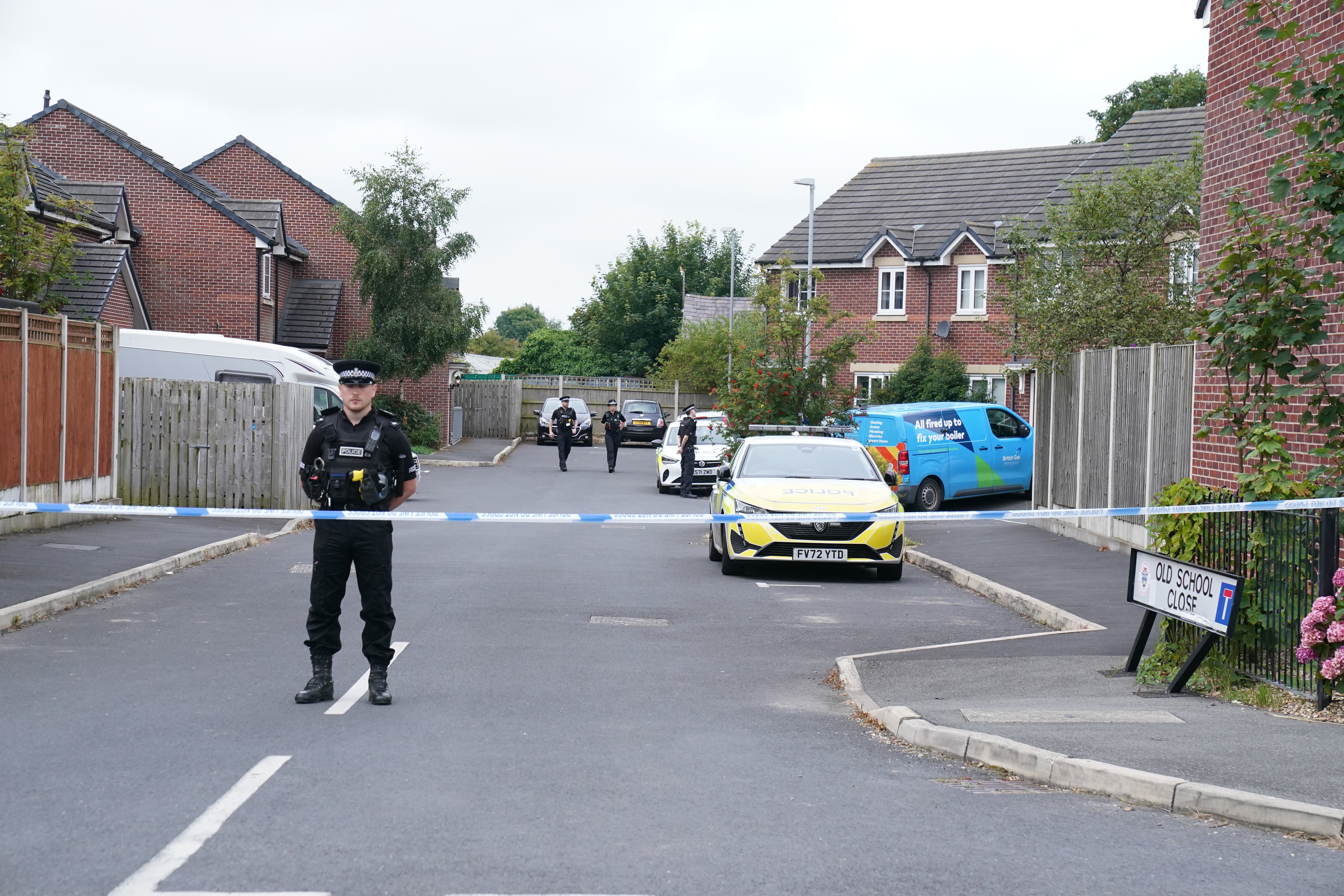 Emergency services at the home of 17-year-old Axel Rudakubana (Owen Humphreys/PA)