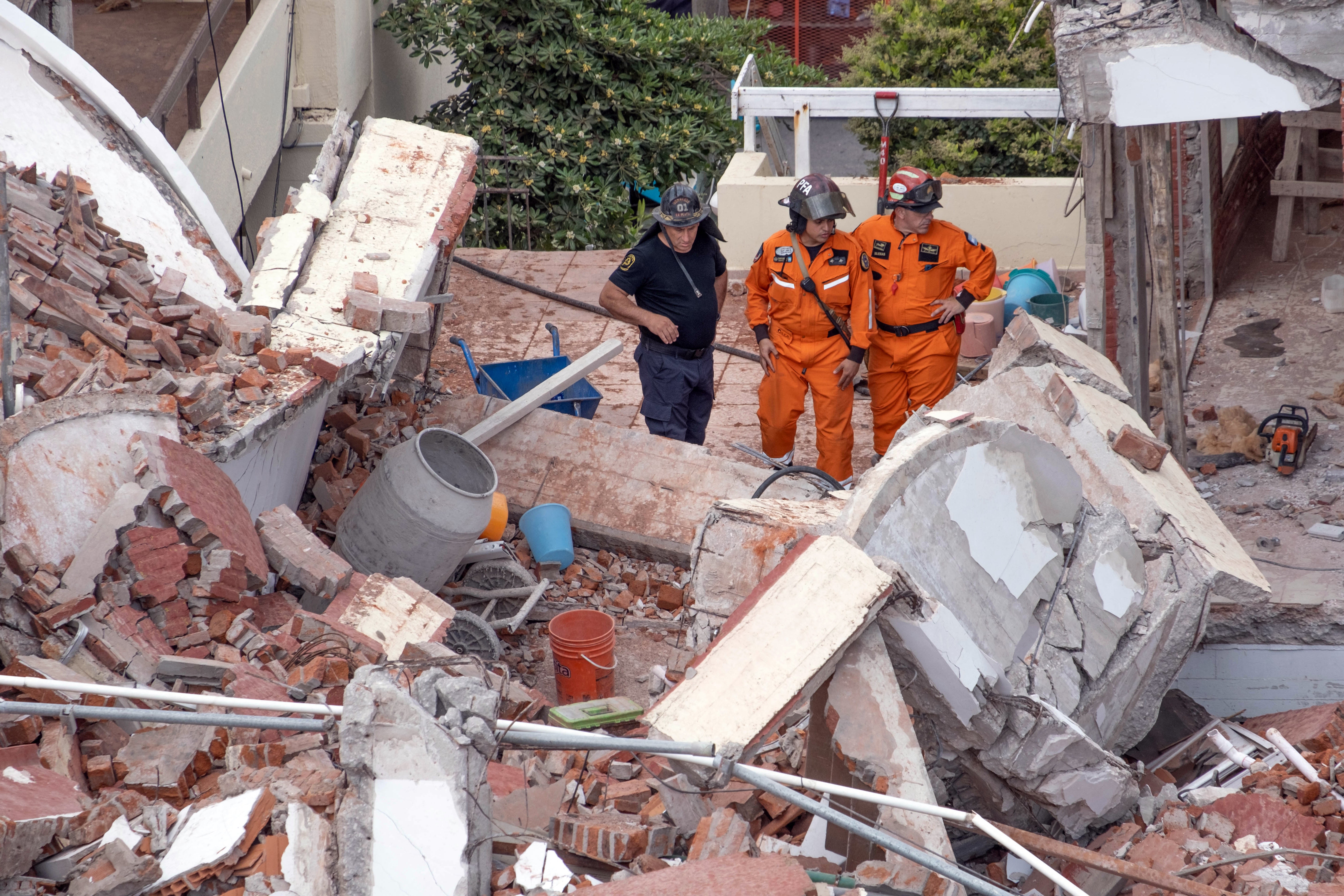 Rescuers search for missing people after the collapse of the Dubrovnik Hotel in the seaside resort of Villa Gessell, Buenos Aires province, on 29 October 2024