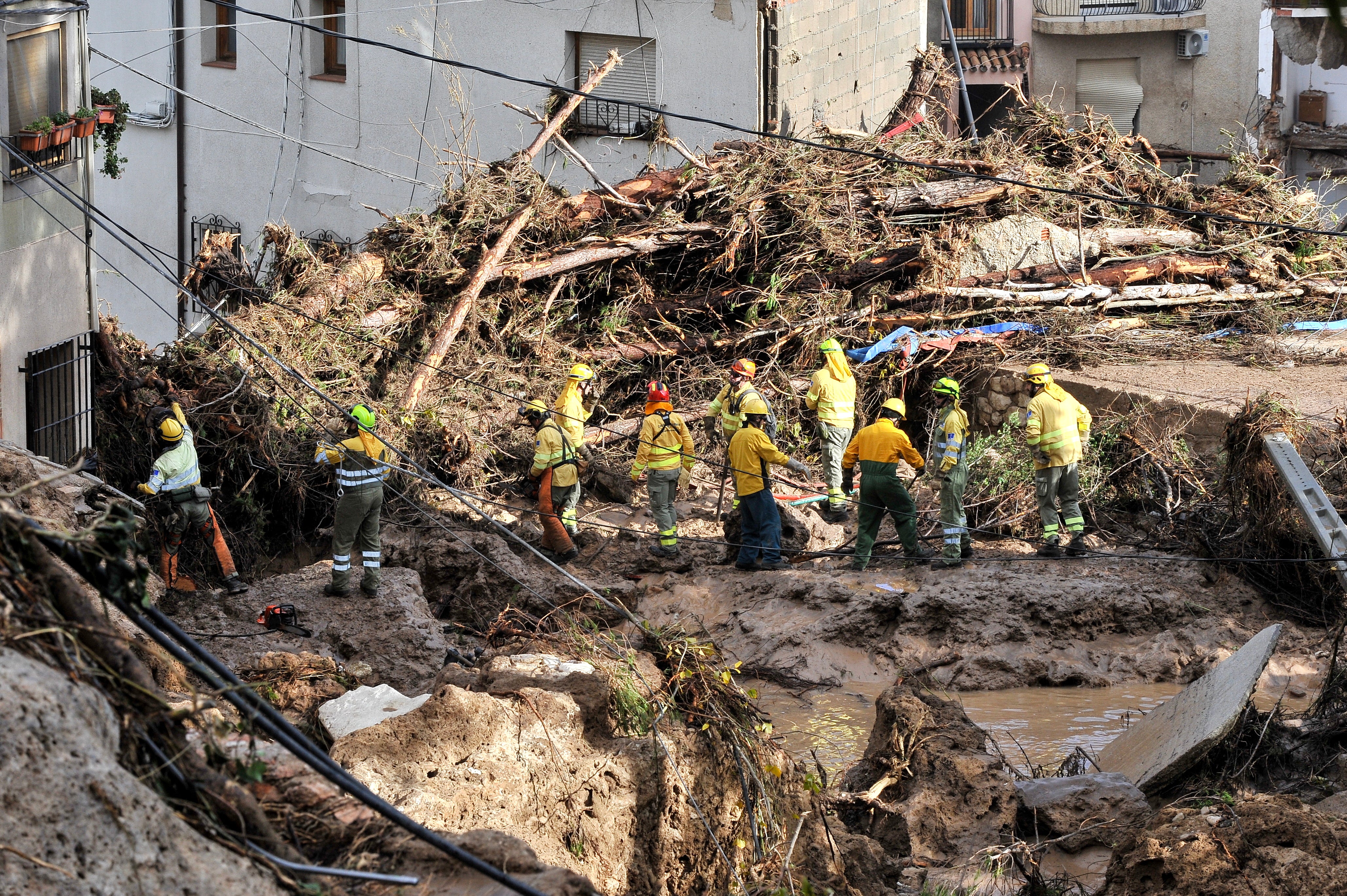 Rescuers search for missing people among debris brought by the floods in Letur, in the province of Albacete, Spain