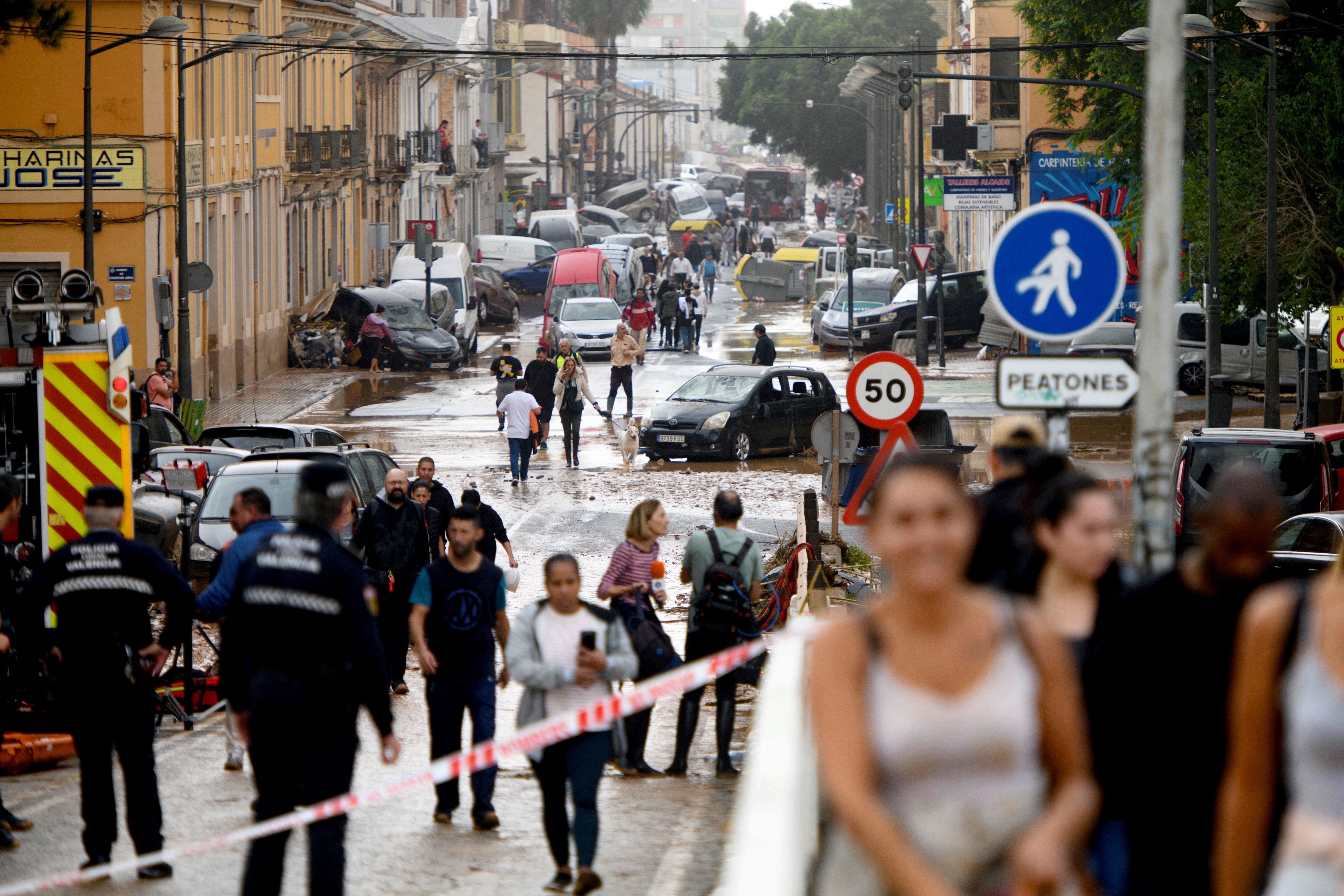 A trail of destruction along a main street in the De La Torre neighbourhood of Valencia