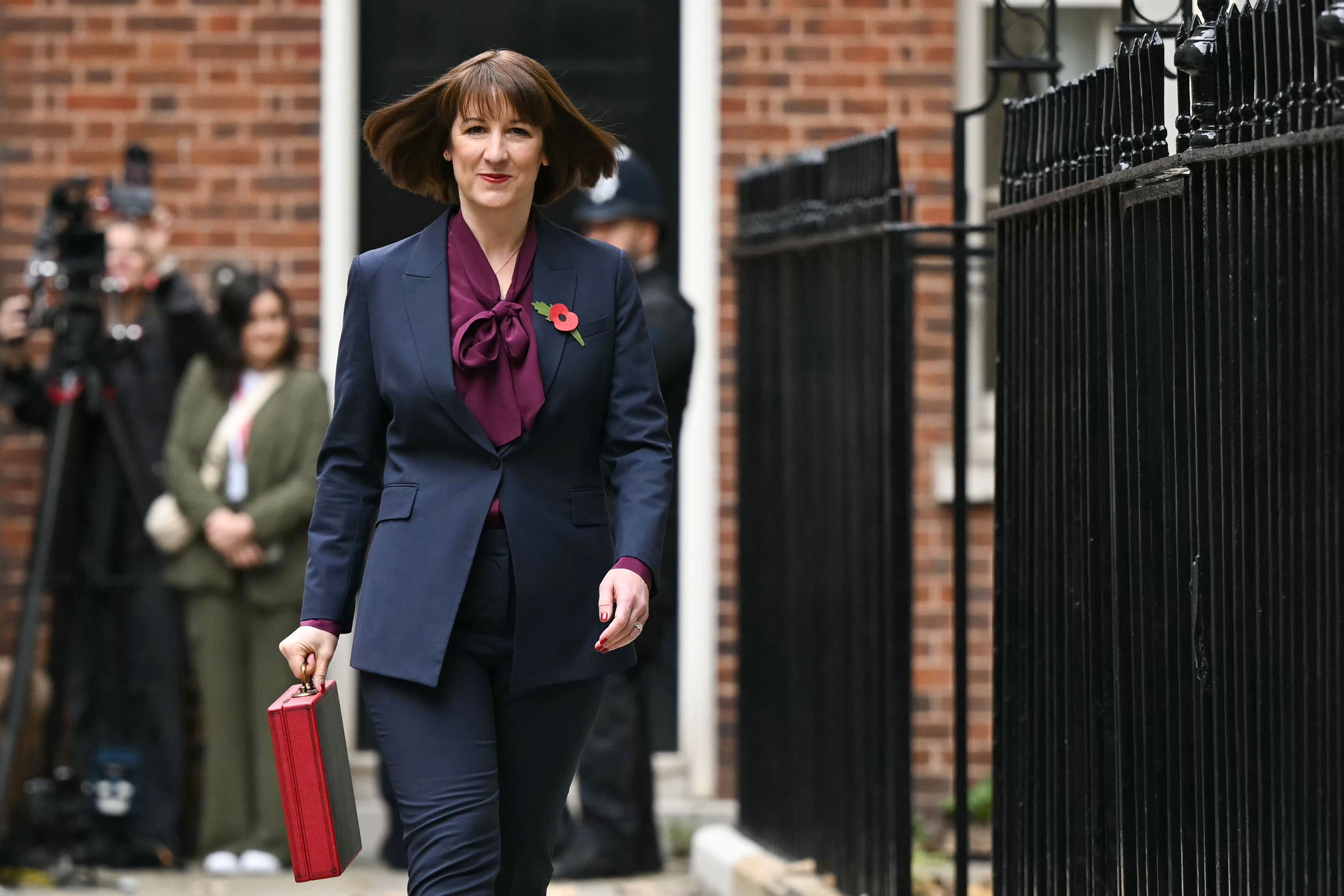 Here’s what the plum pussy-bow blouse stands for (Justin Tallis/PA)