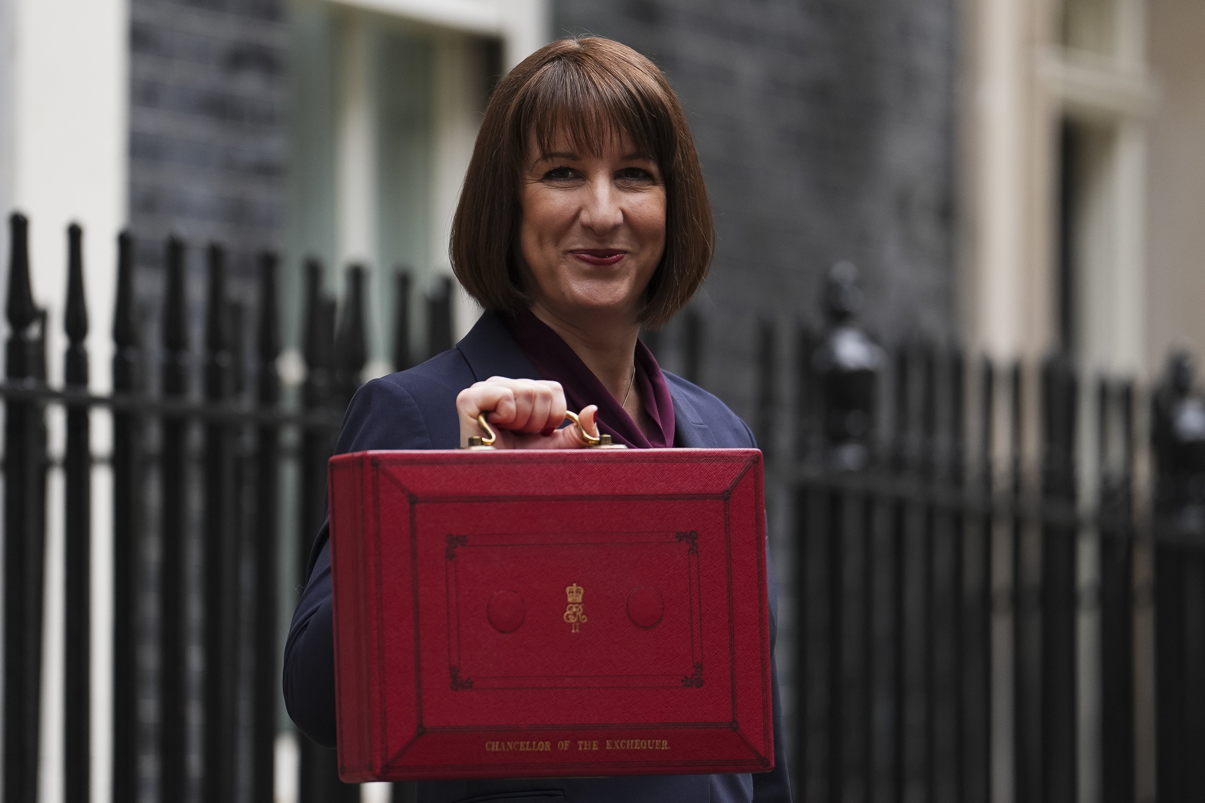 Chancellor of the Exchequer Rachel Reeves announced that national insurance, VAT or income tax would not rise for working people (Jordan Pettitt/PA)