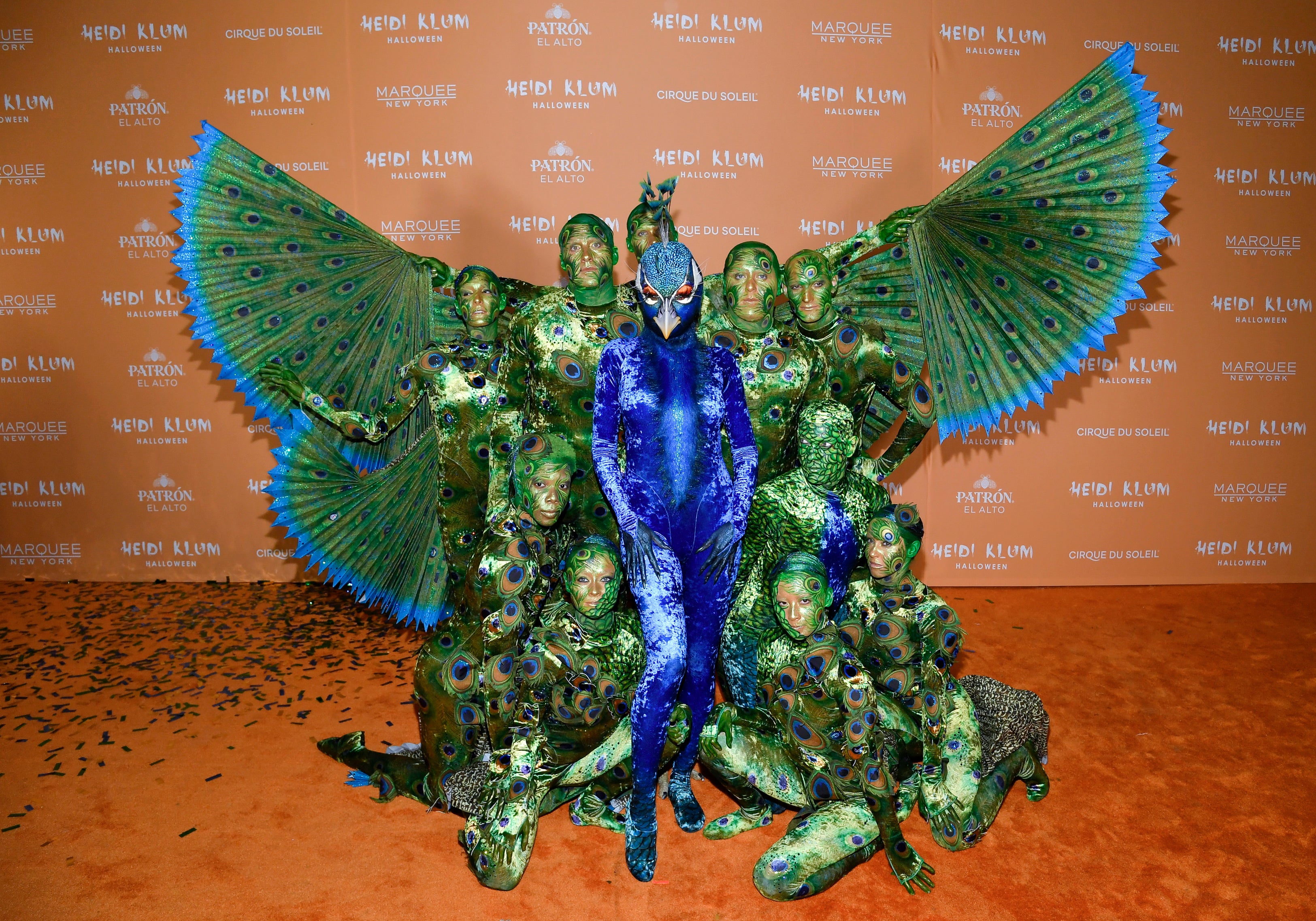 Heidi Klum, center, in blue, arrives at her 22nd annual Halloween party at Marquee on Tuesday, Oct. 31, 2023