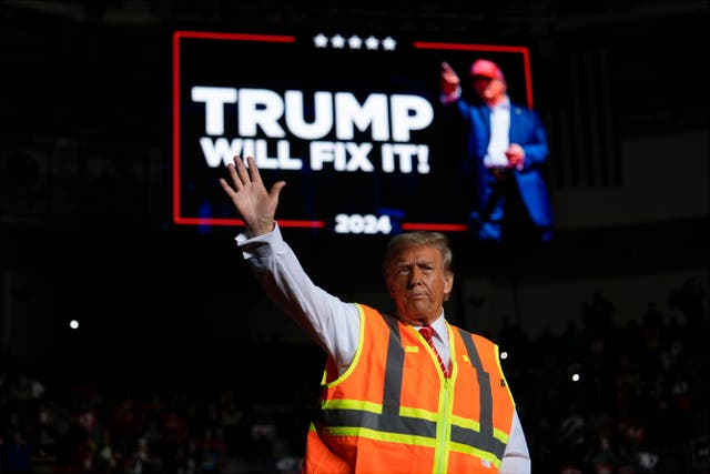 <p>Republican presidential nominee former President Donald Trump waves after speaking at a campaign rally at Resch Center, Wednesday, Oct. 30, 2024, in Green Bay, Wisconsin</p>