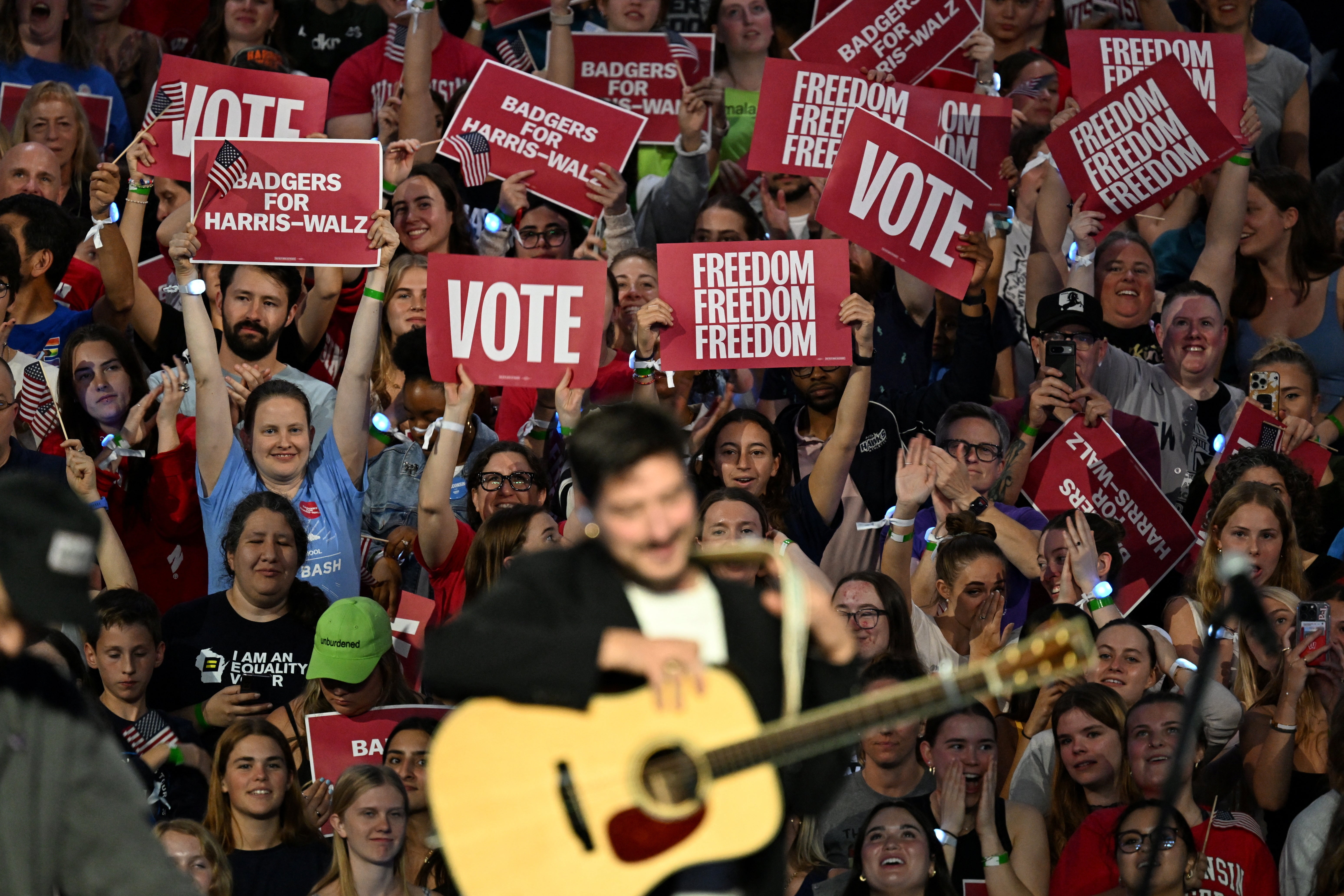 Supporters cheer as Mumford and Sons band performs during a campaign rally for Democratic presidential nominee U.S. Vice President Kamala Harris