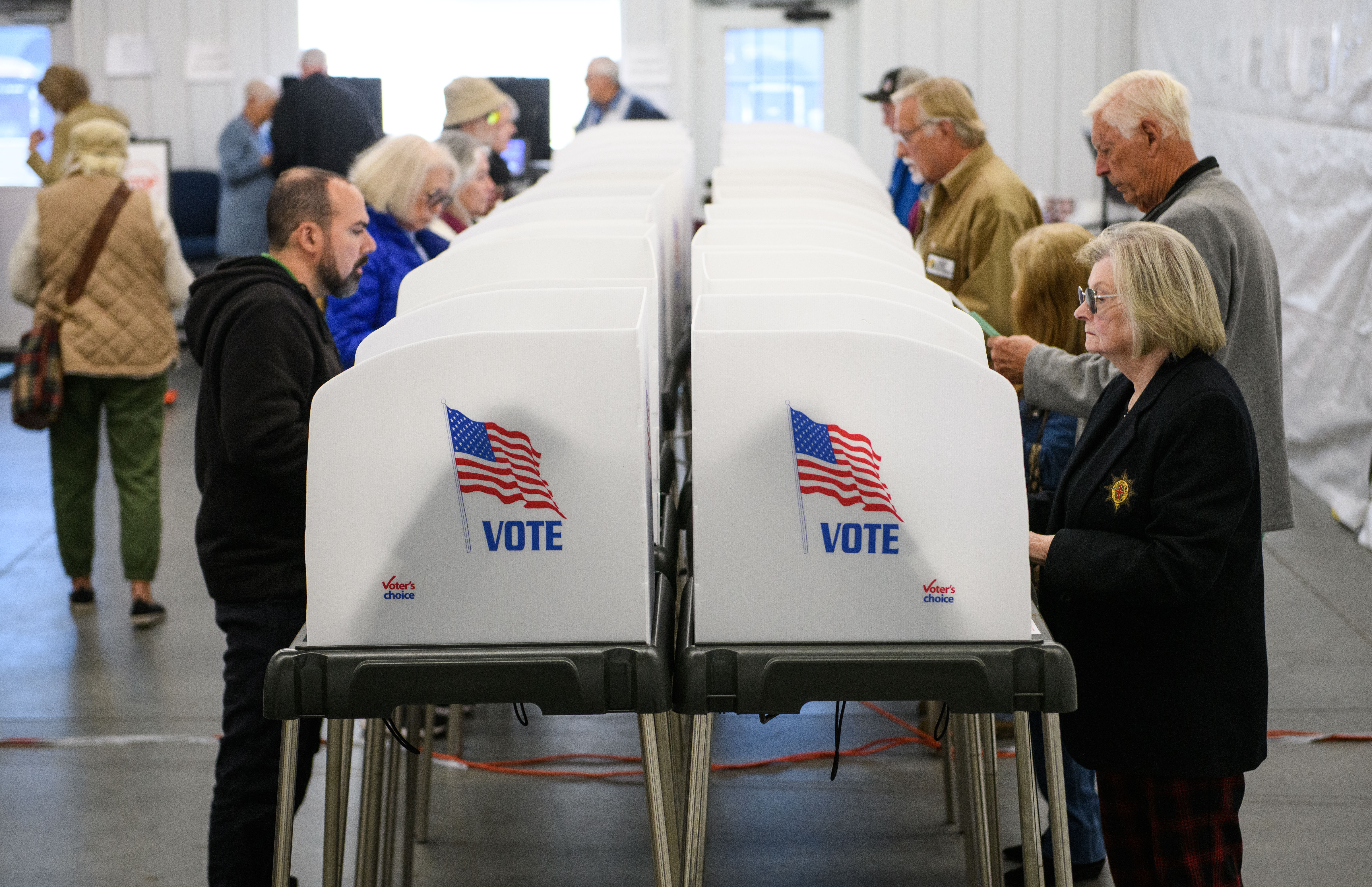 Voters cast early ballots in North Carolina on October 17. The state beat turnout records on the first day of early voting