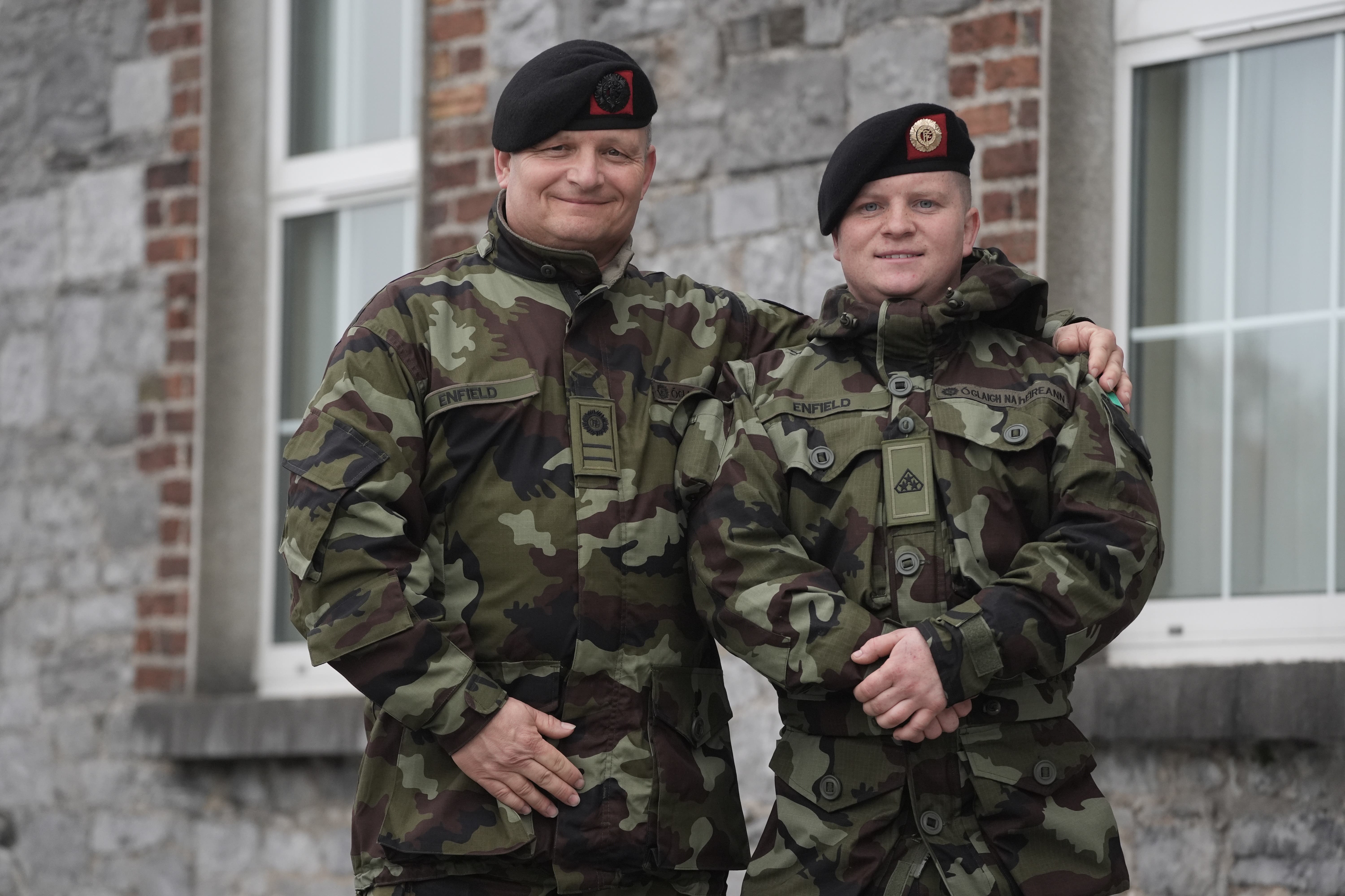 Battalion Sergeant Major Patrick Enfield (left) and his son Private Adam Enfield after Tanaiste and Minister for Defence, Micheal Martin reviewed troops ahead of their deployment to Lebanon (Brian Lawless/PA)