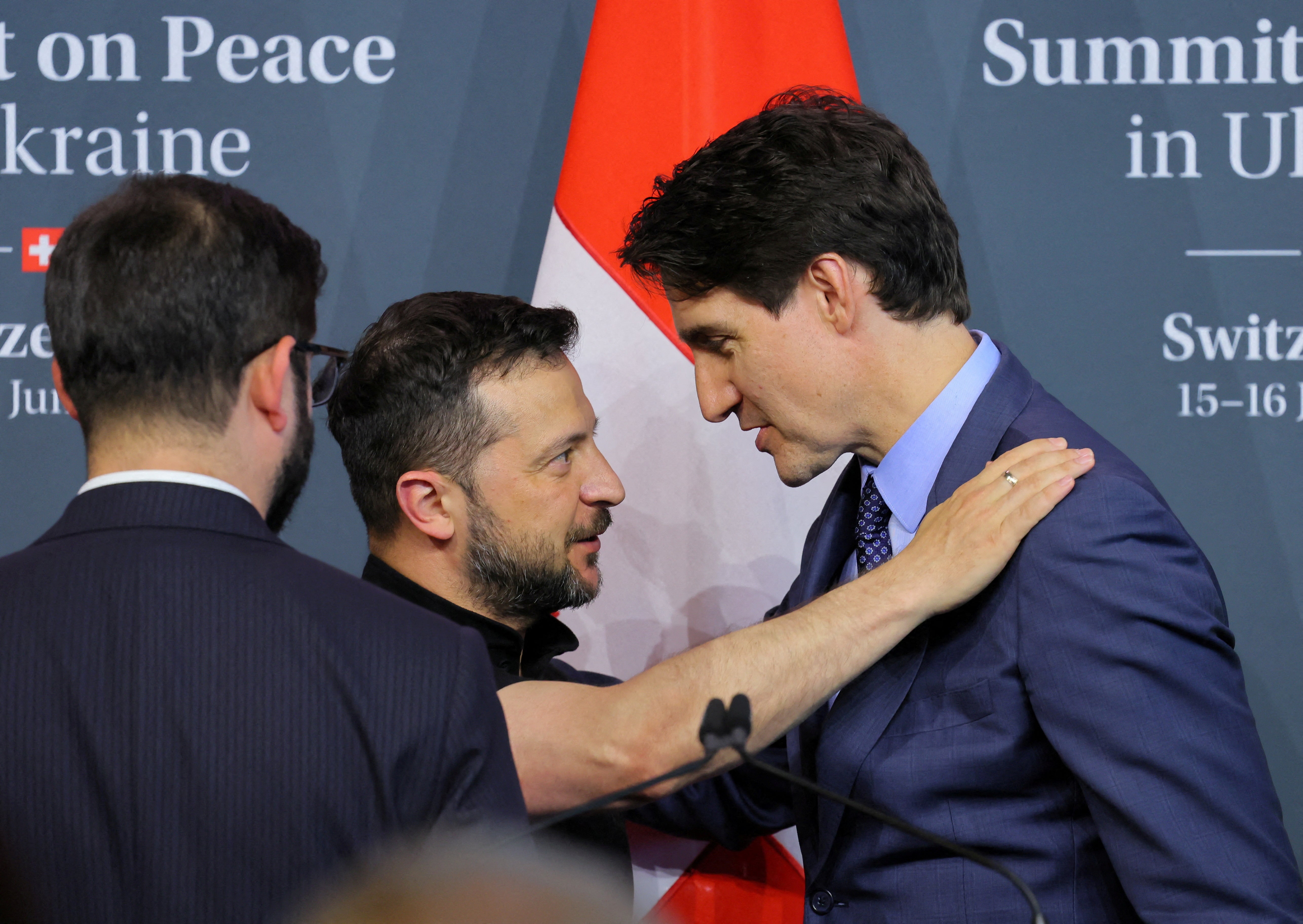 Ukraine's President Volodymyr Zelensky and Canada's Prime Minister Justin Trudeau talk at Summit on Peace in Ukraine