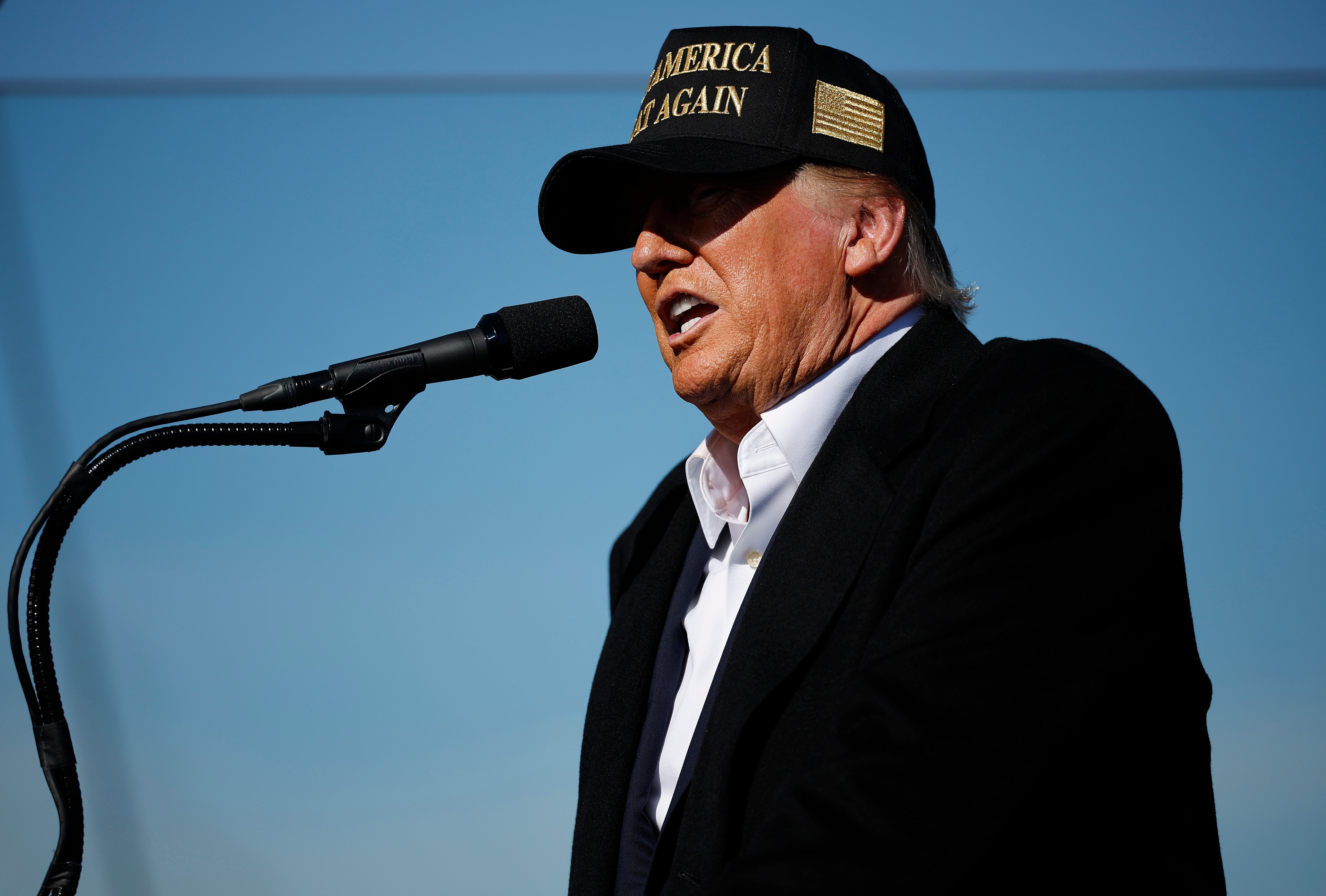 Donald Trump, spealking to supporters in New Mexico on October 31, has sued CBS News, alleging election interference over its interview with Kamala Harris.