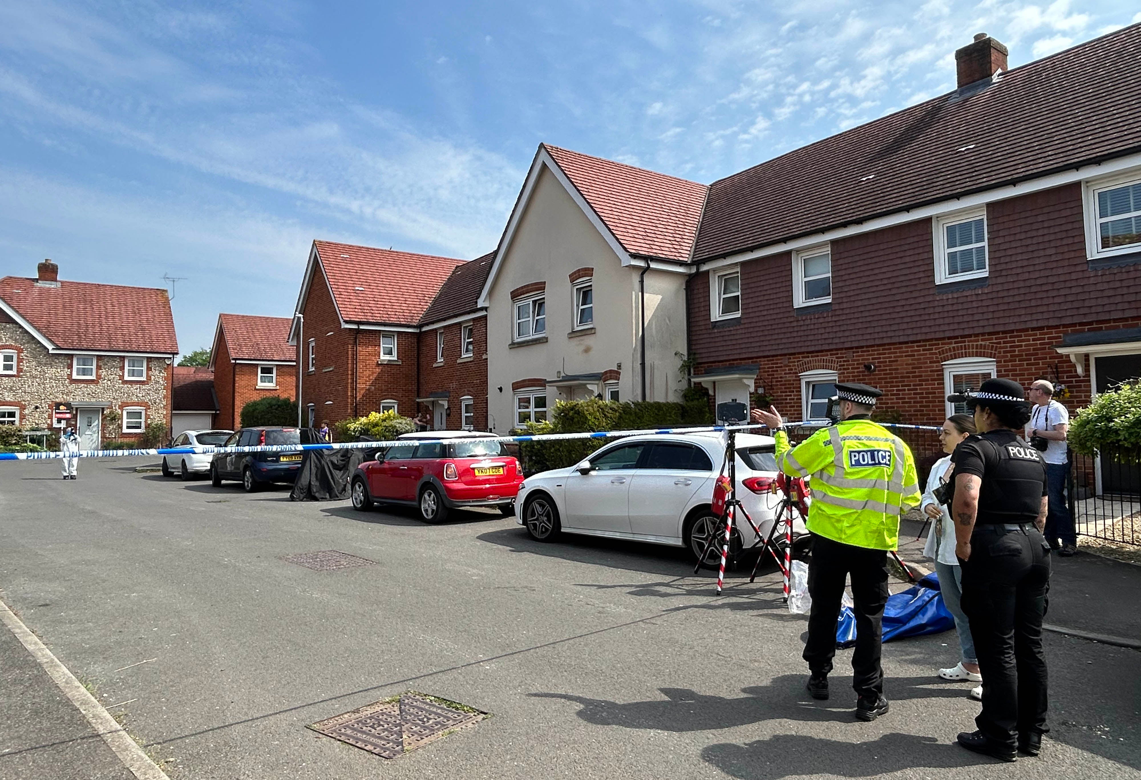 Police talk to neighbours after Jason King was arrested