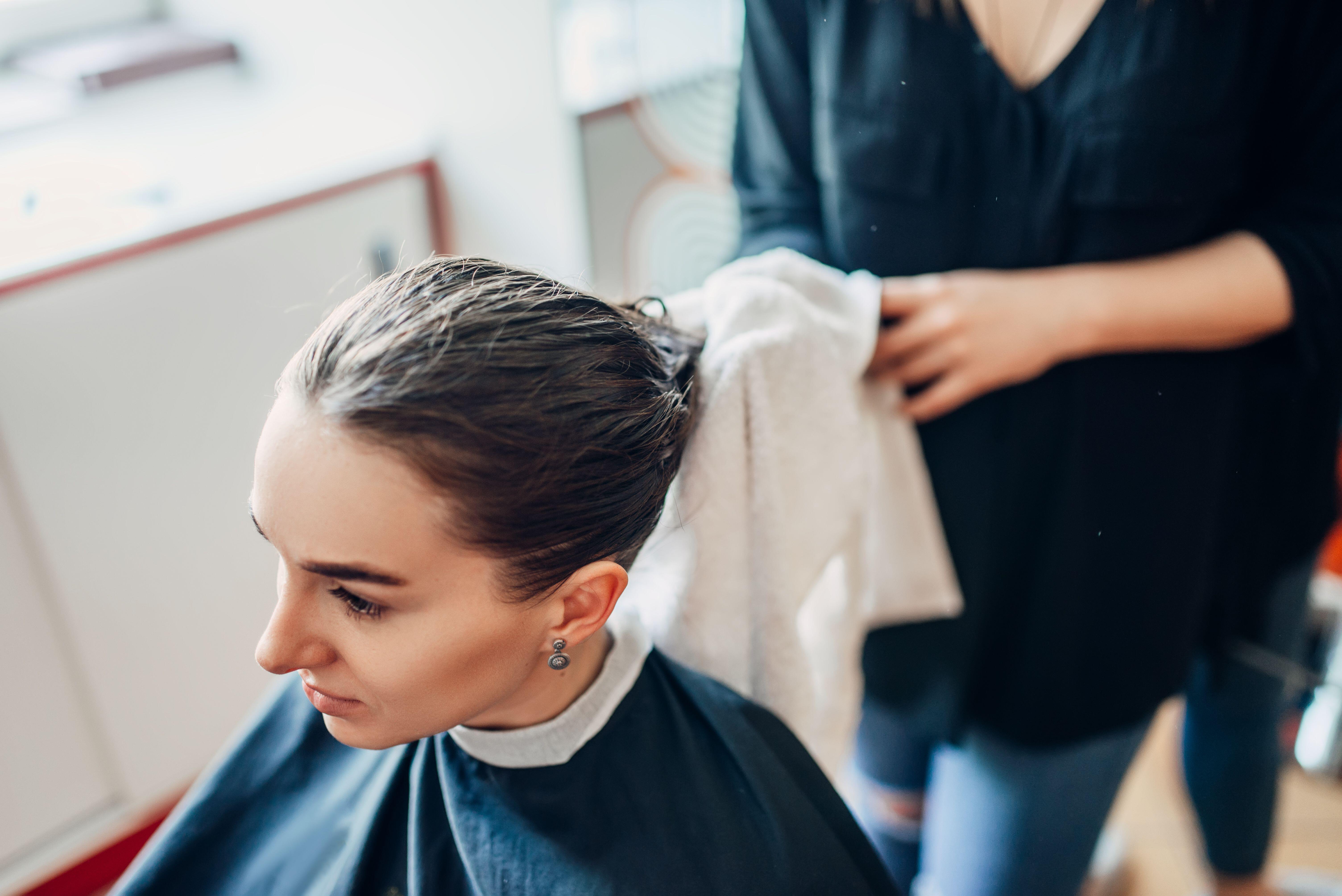 Deep conditioning treatments with Vitamin C can help unclog mineral build up from hair (Alamy/PA)