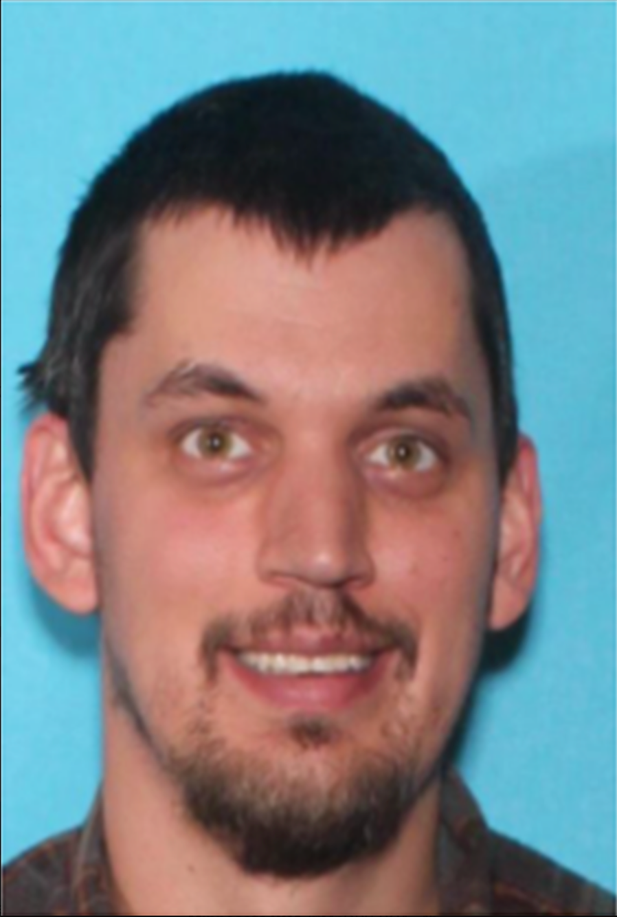 Photo of Chad Aanerud, 35, who is accused of abducting his girlfriend and her four children