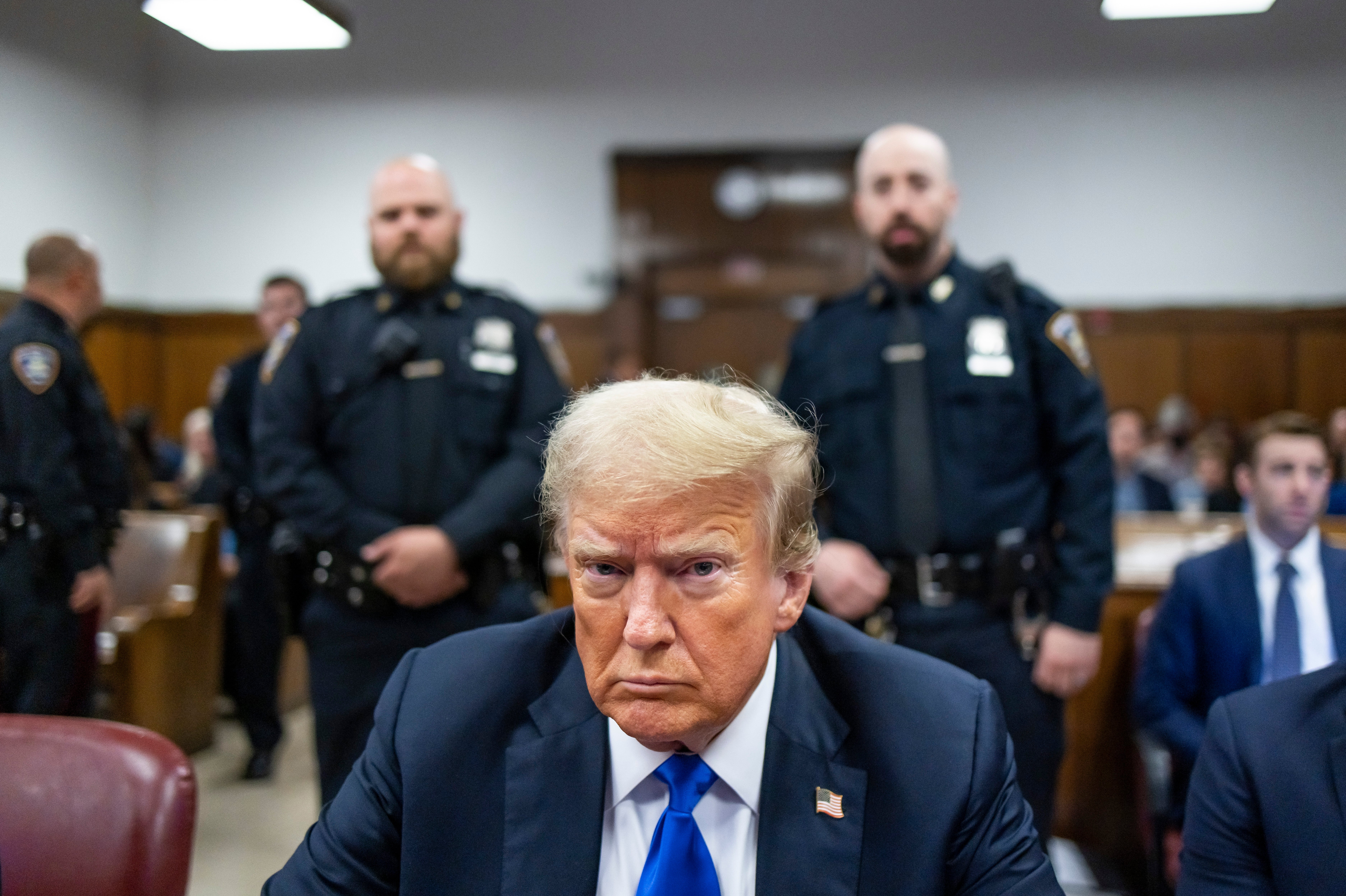 Trump sits at the defendant's table inside the Manhattan Criminal Court where he was found guilty of 34 charges and became the first former US president to be convicted of felony crimes