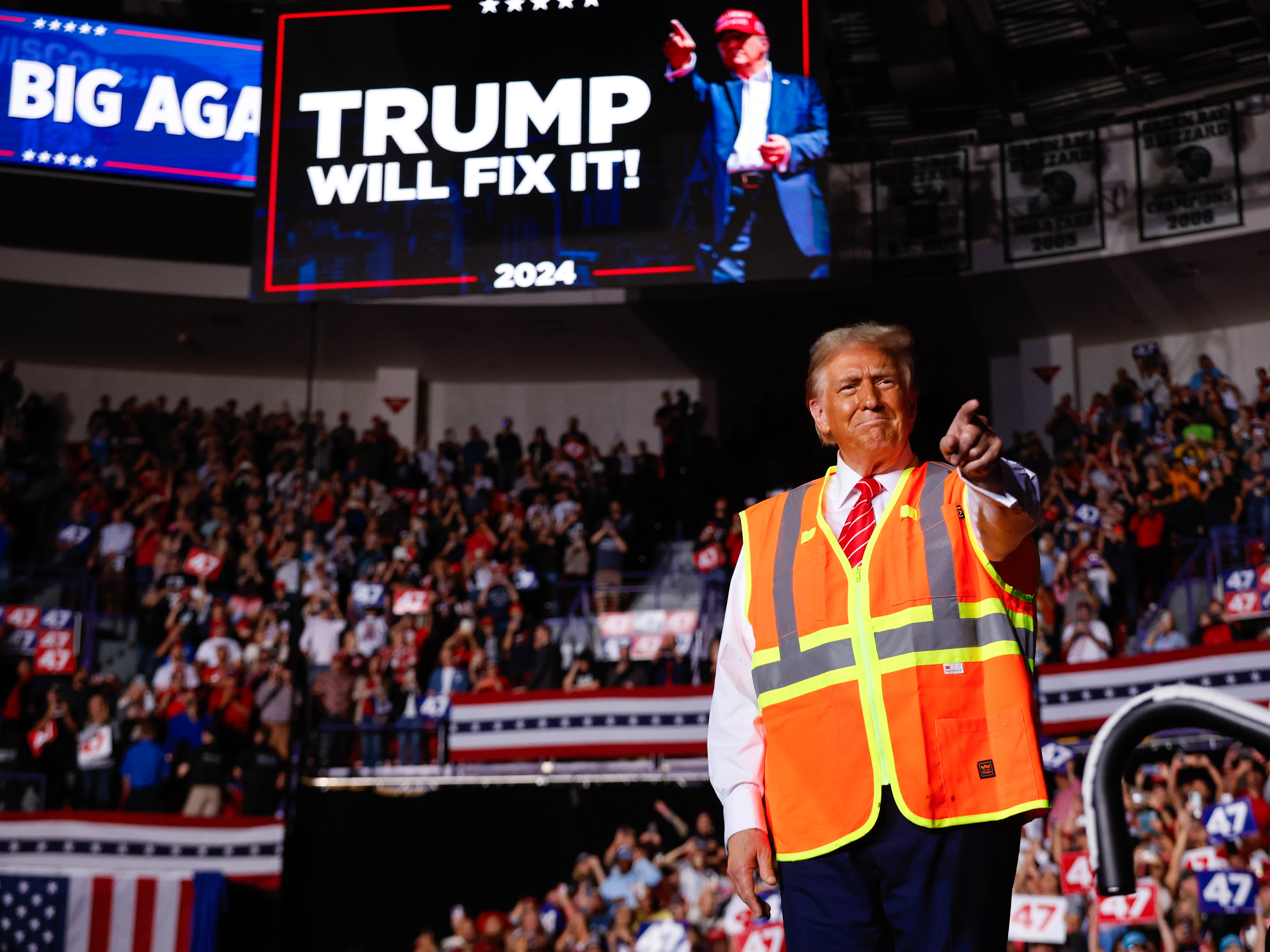 Republican presidential nominee, former President Donald Trump greets supporters during a campaign event in Green Bay, Wisconsin, where he vowed to protect women ‘whether the women like it or not’.