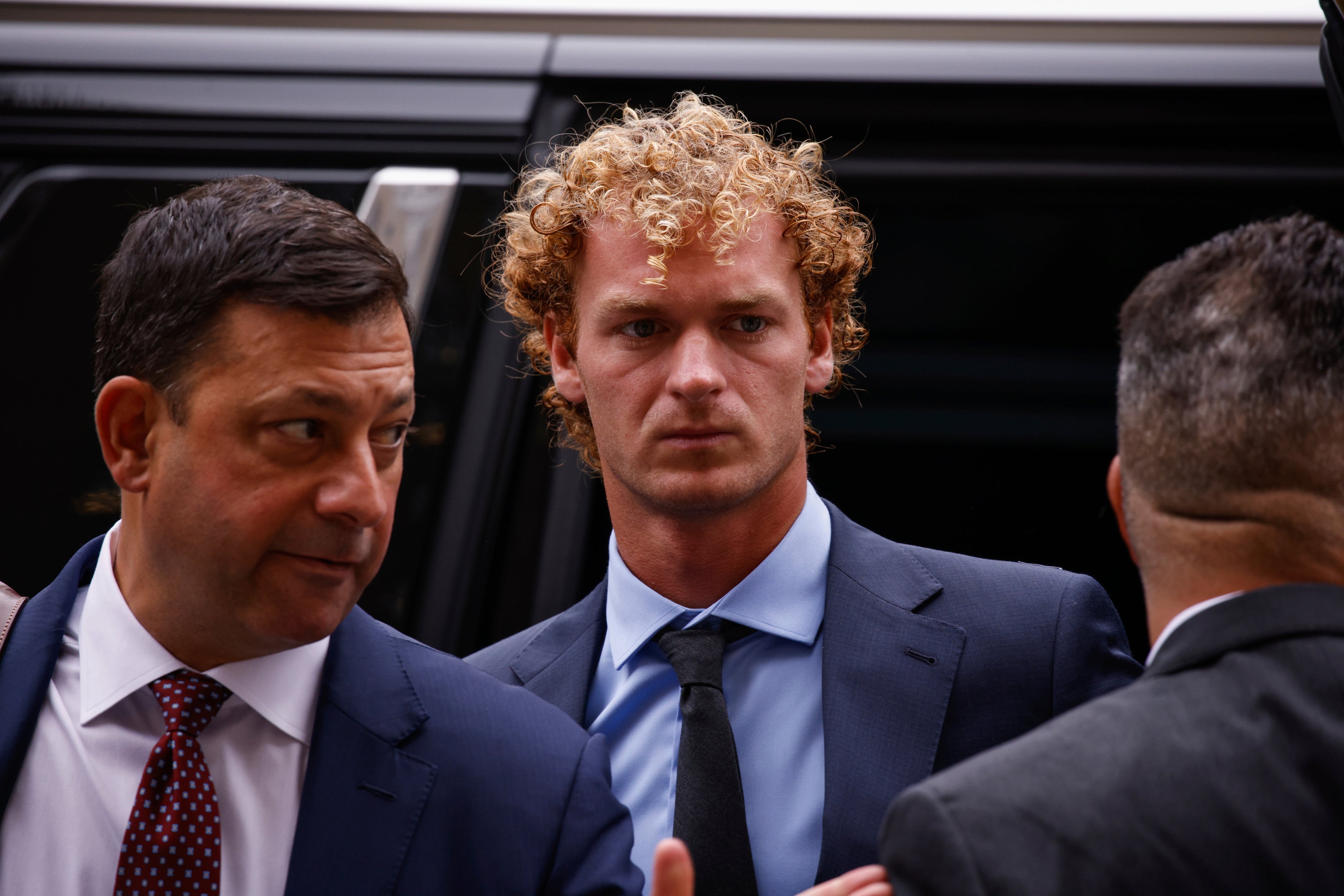 Daniel Penny, accused of choking a distressed Black subway rider to death, arrives for opening statements in New York on November 1