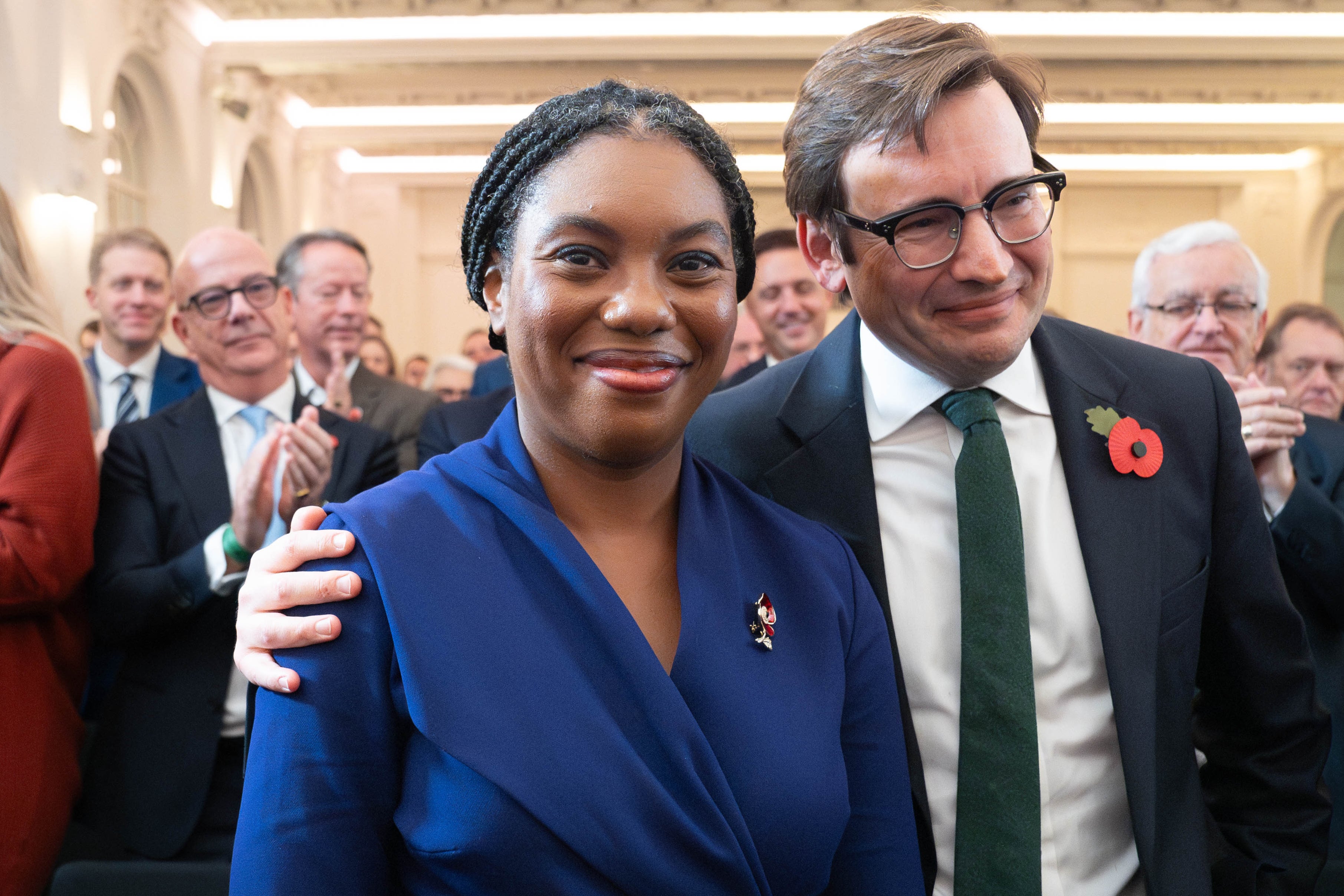 Kemi Badenoch celebrates with her husband Hamish on Saturday