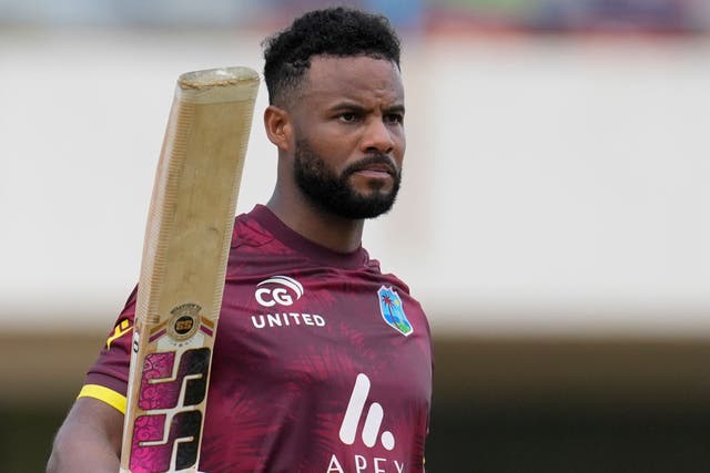 Shai Hope celebrates his hundred in Antigua (Ricardo Mazalan/AP)