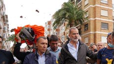 Angry crowds throw mud and hurl insults at King of Spain as search continues for flood victims