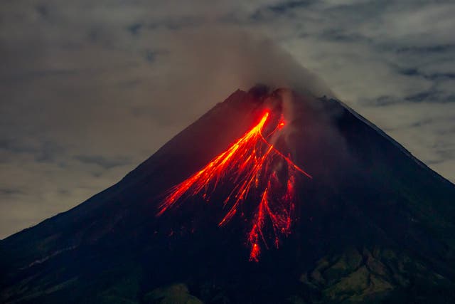 <p>File image: Mount Merapi spews lava onto its slopes during an eruption as seen from Srumbung village in Magelang, Central Java </p>