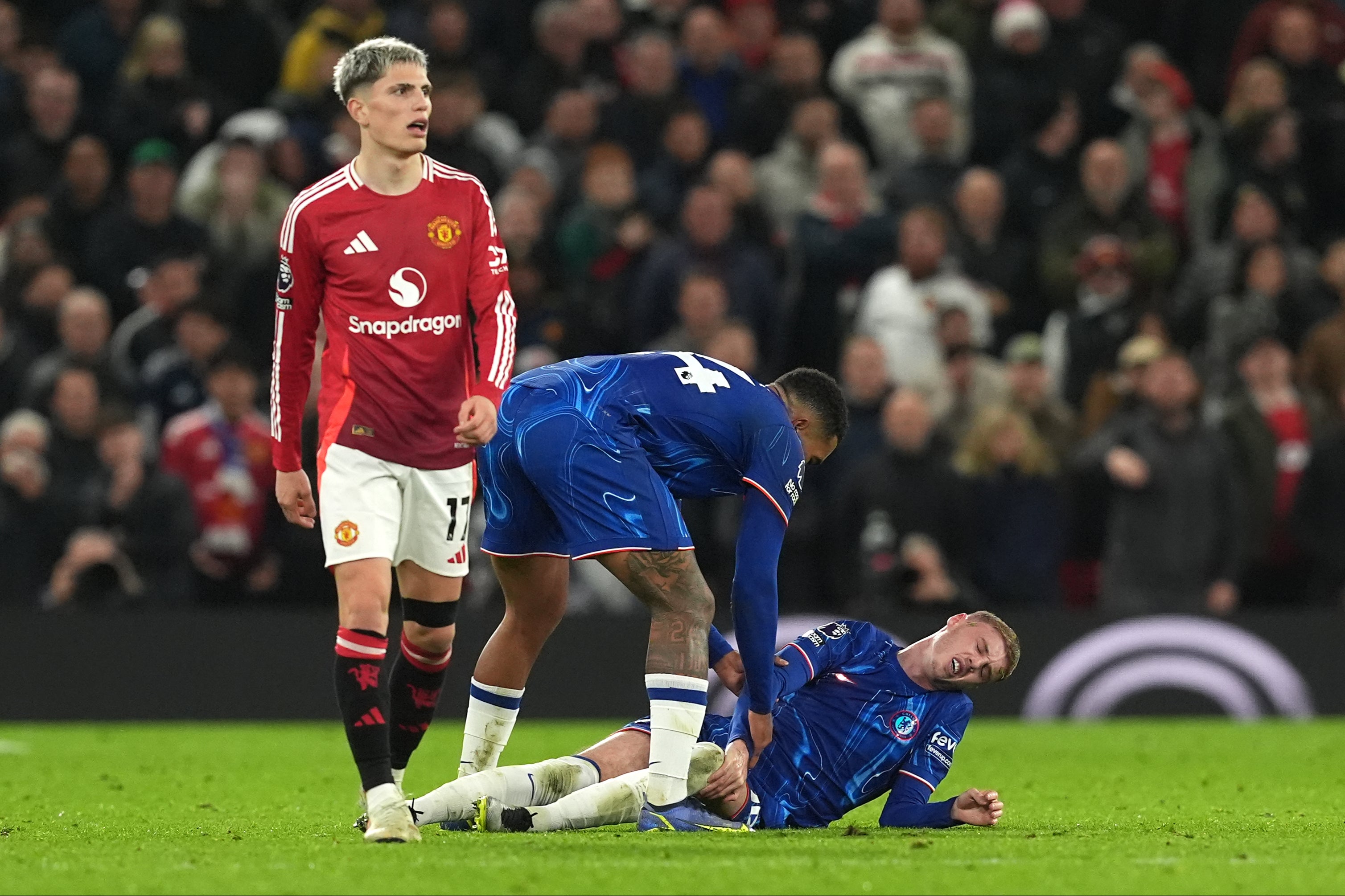 Cole Palmer was injured in a tackle from Lisandro Martinez late on at Old Trafford