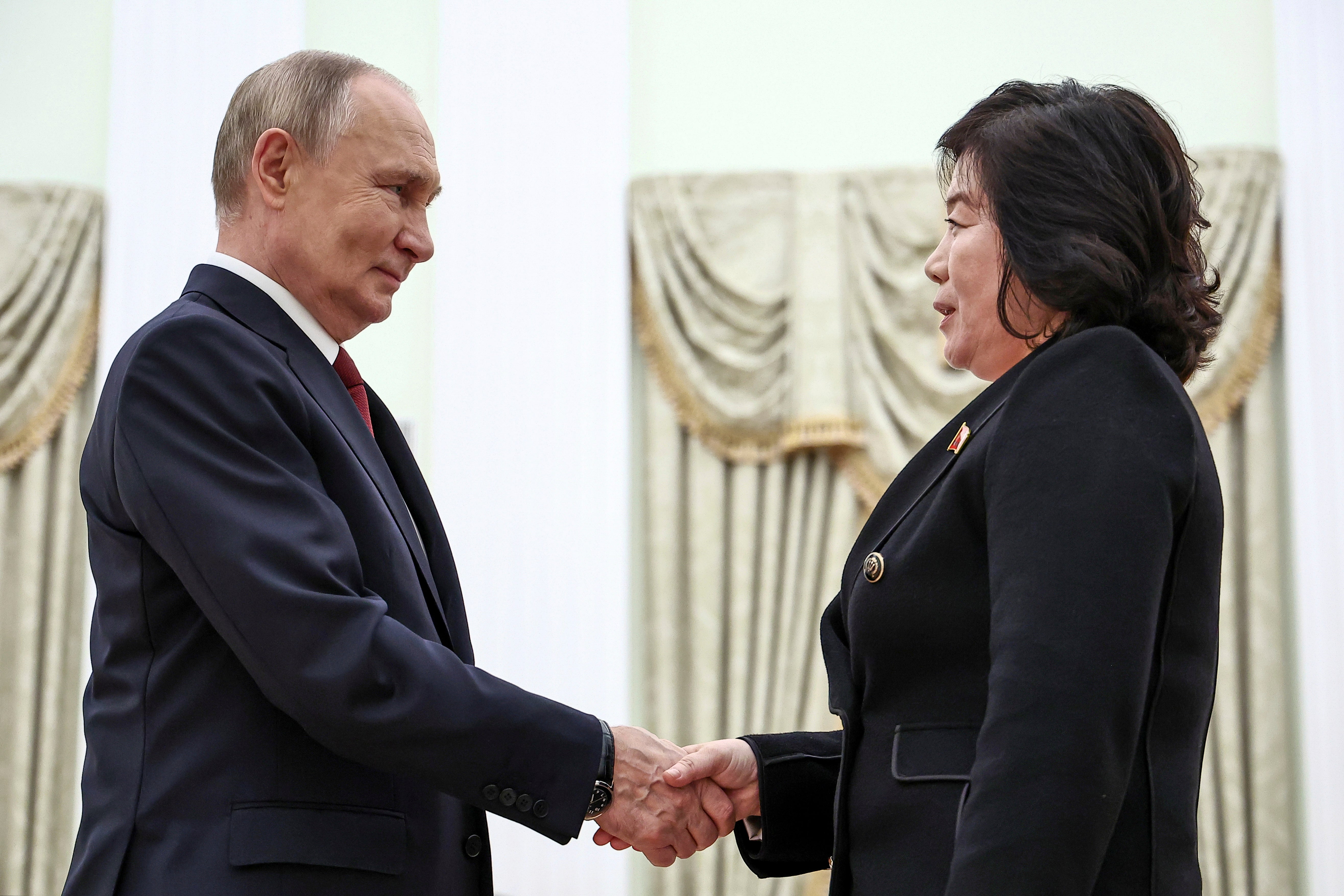 Russian President Vladimir Putin greets North Korean Foreign Minister Choe Son Hui