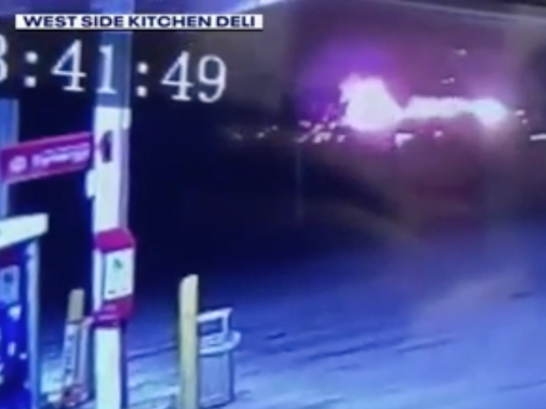 A fireball explodes into the night on November 2, 2024, as a semitruck crashes into a line of stopped cars on Interstate 96 near Webberville, Michigan. Four people were killed in the crash and 17 others were injured