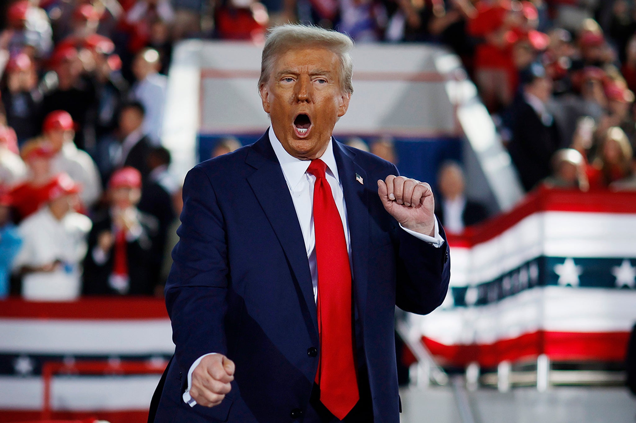 Trump dances off stage at a campaign rally in Raleigh, North Carolina