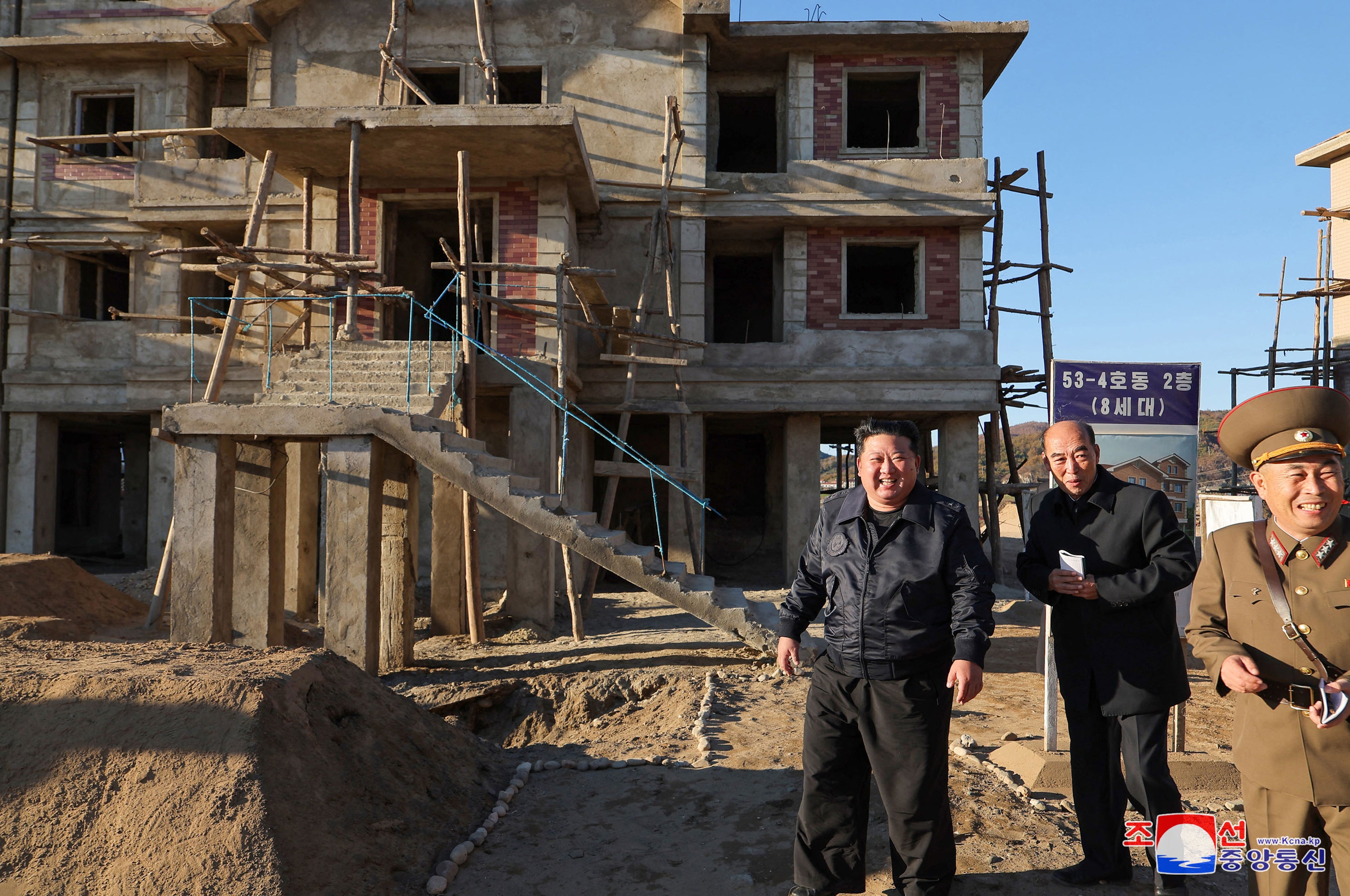 File: North Korea's leader Kim Jong Un visits a flood restoration construction site in North Pyongan Province