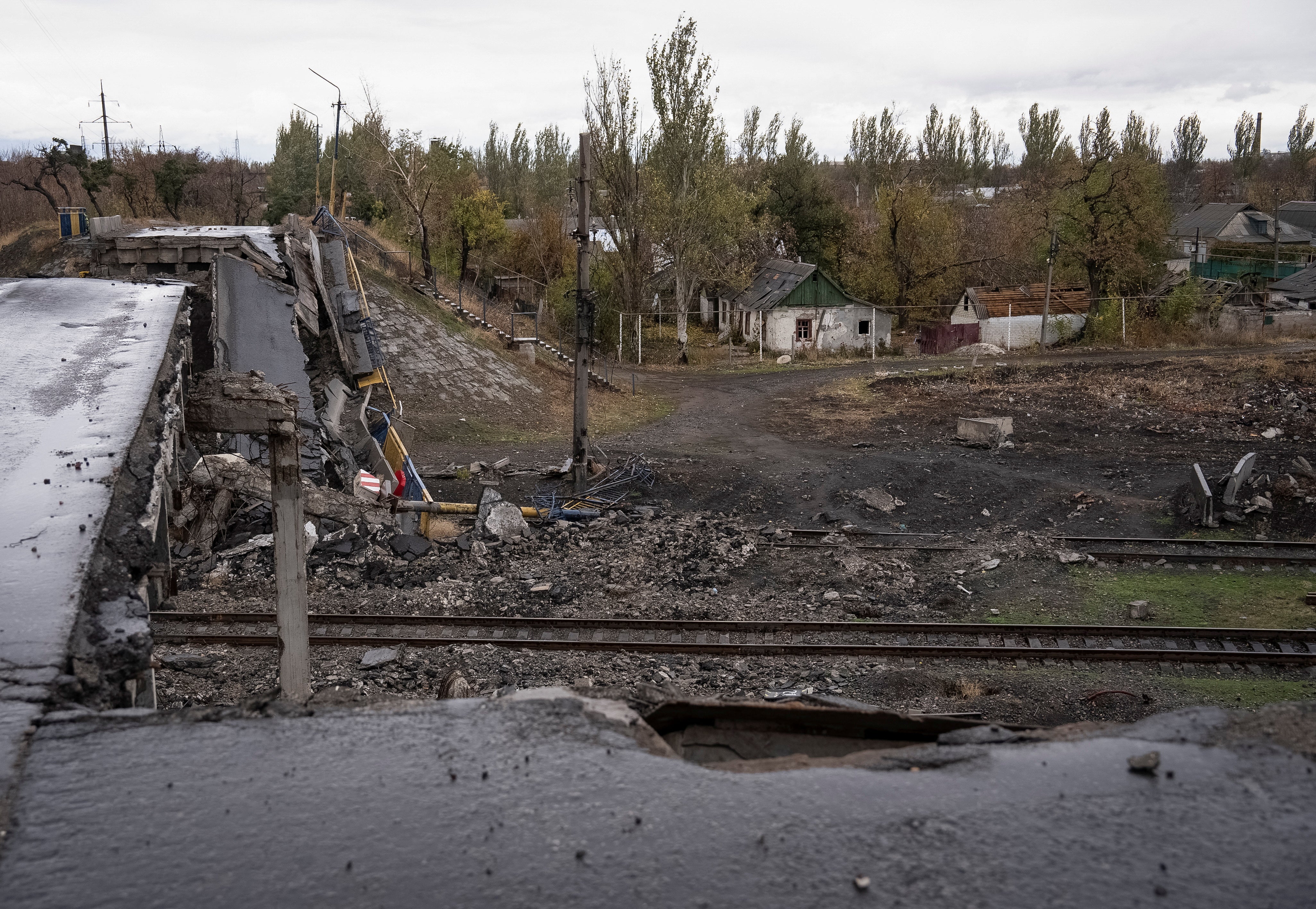 A view shows a destroyed bridge in the town of Pokrovsk in Donetsk region, Ukraine