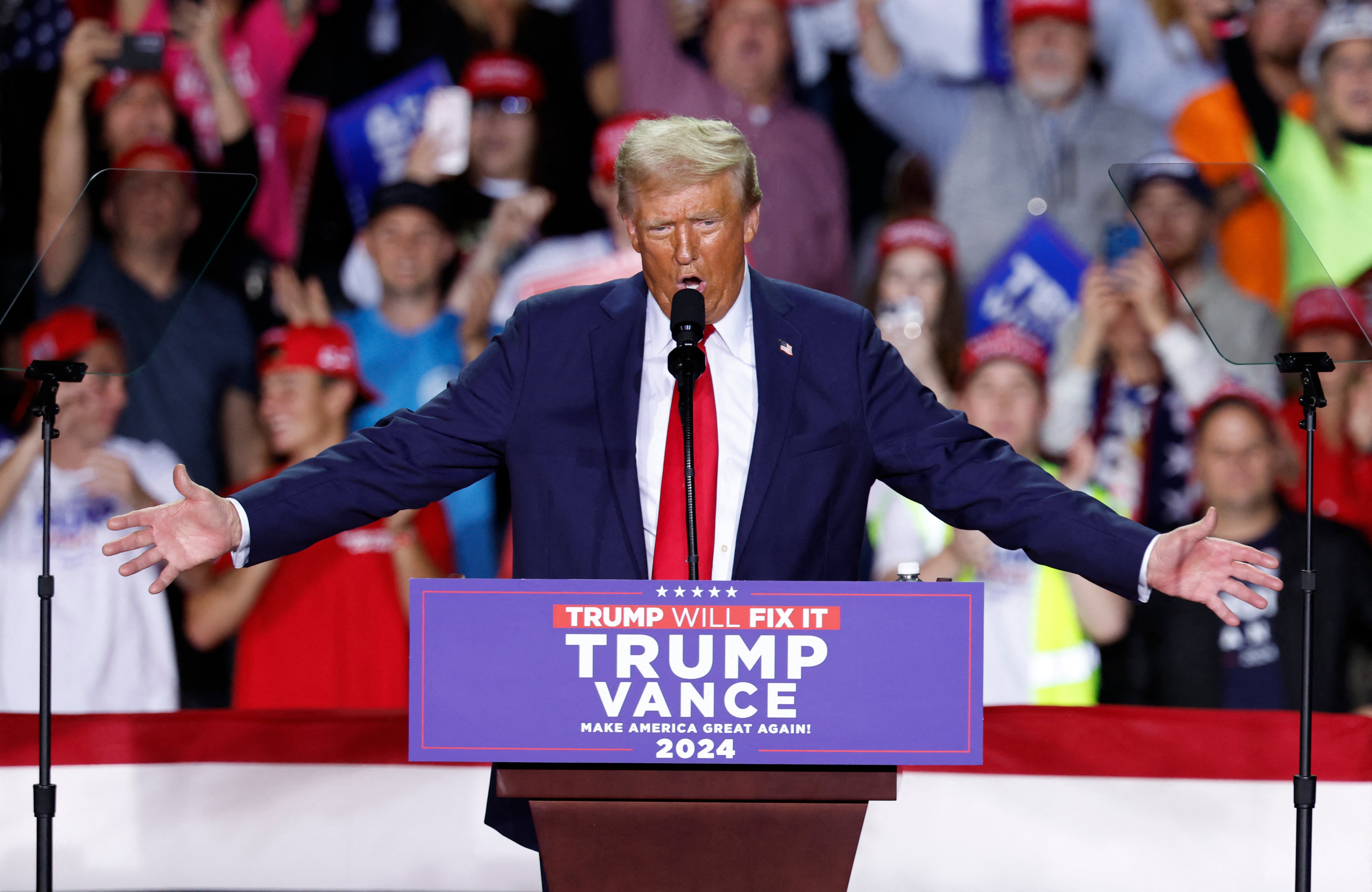 Trump speaks during his final 2024 presidential campaign rally in Grand Rapids, Michigan, on the eve of the election