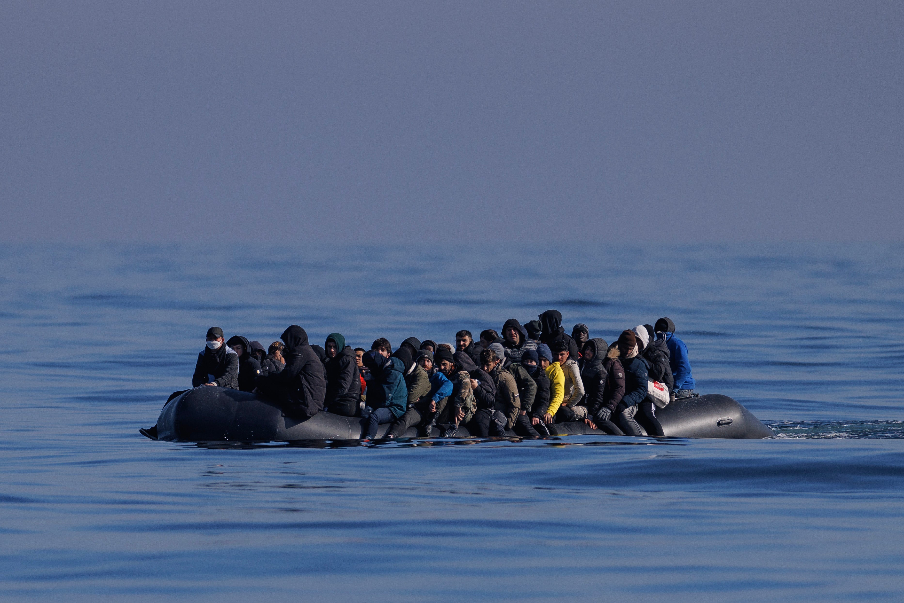 An inflatable dinghy carrying around 65 migrants crosses the English Channel on March 06, 2024 in the English Channel.