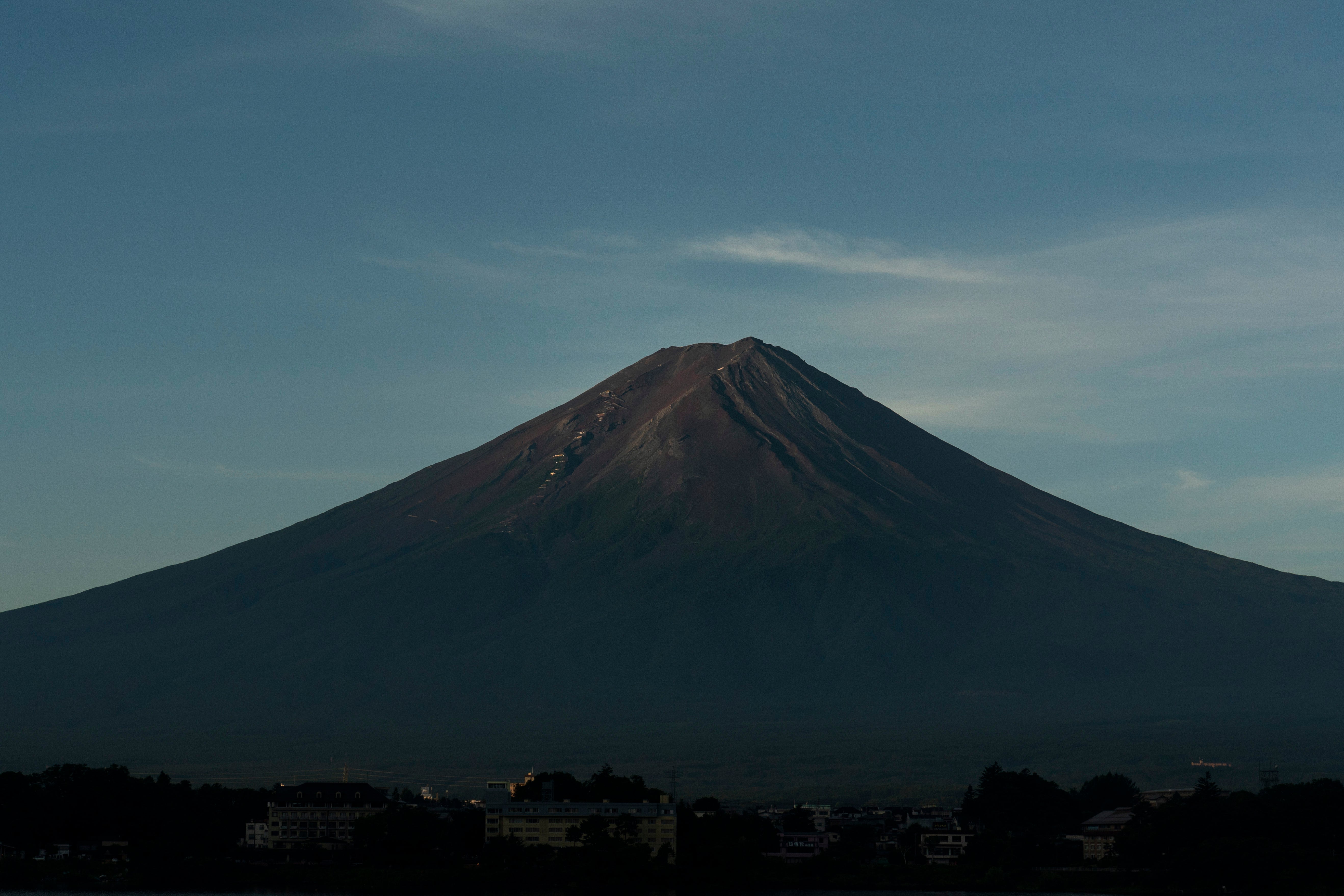 Mount Fuji in the early morning sunlight is seen from Lake Kawaguchi, Japan, on Aug. 7, 2019