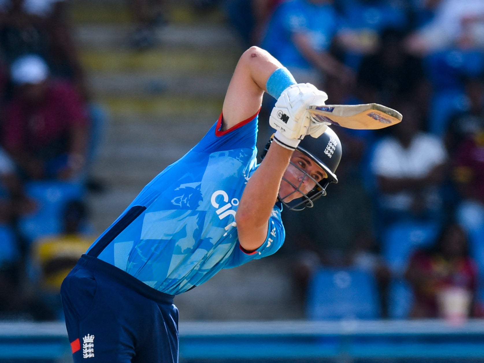 Jacob Bethell of England hits a four against the West Indies on his way to a half century in Antigua