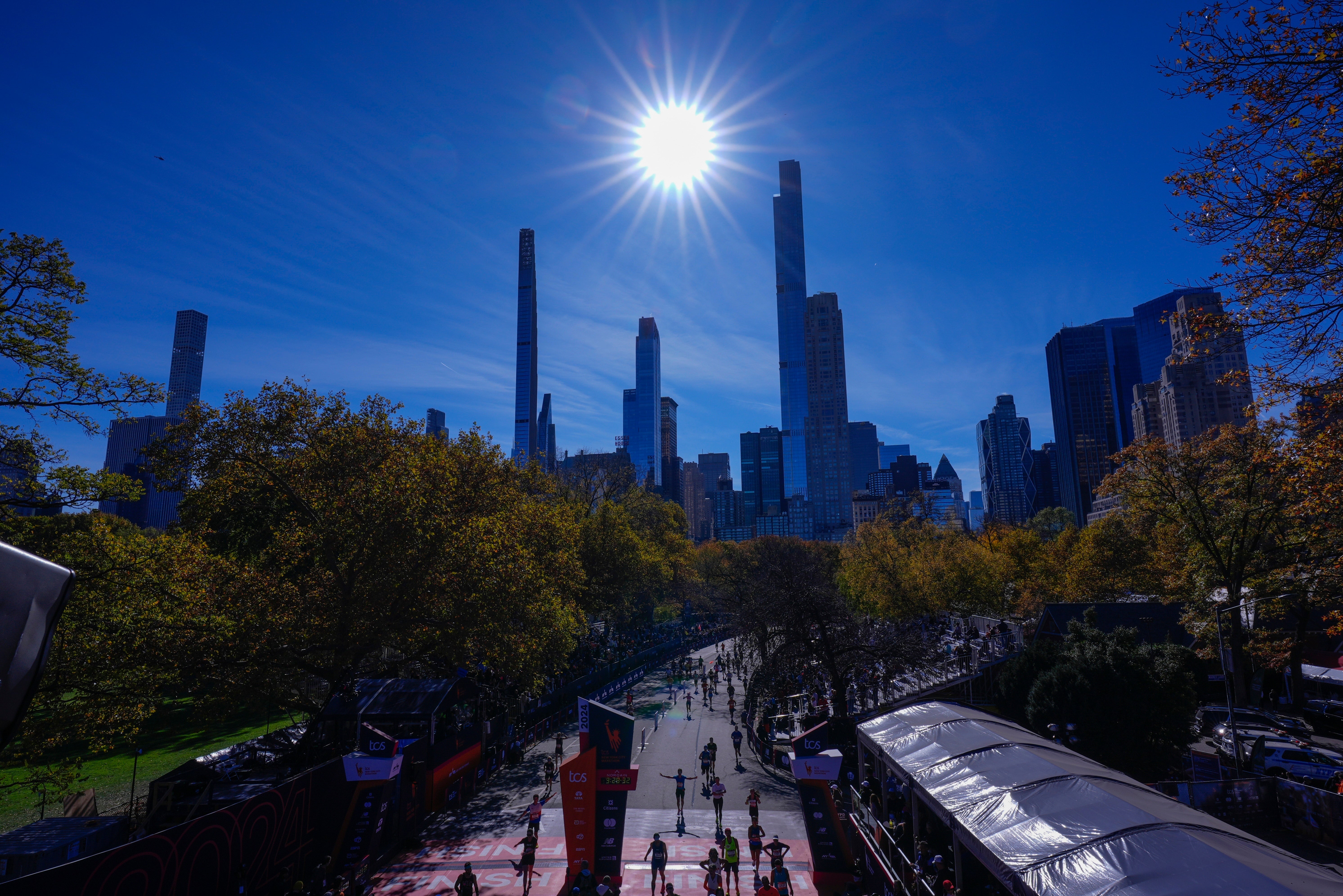 Participants approach the finish line of the New York City Marathon on Sunday. New York City has been placed under a Drought Watch. The city told its millions of residents to conserve water.