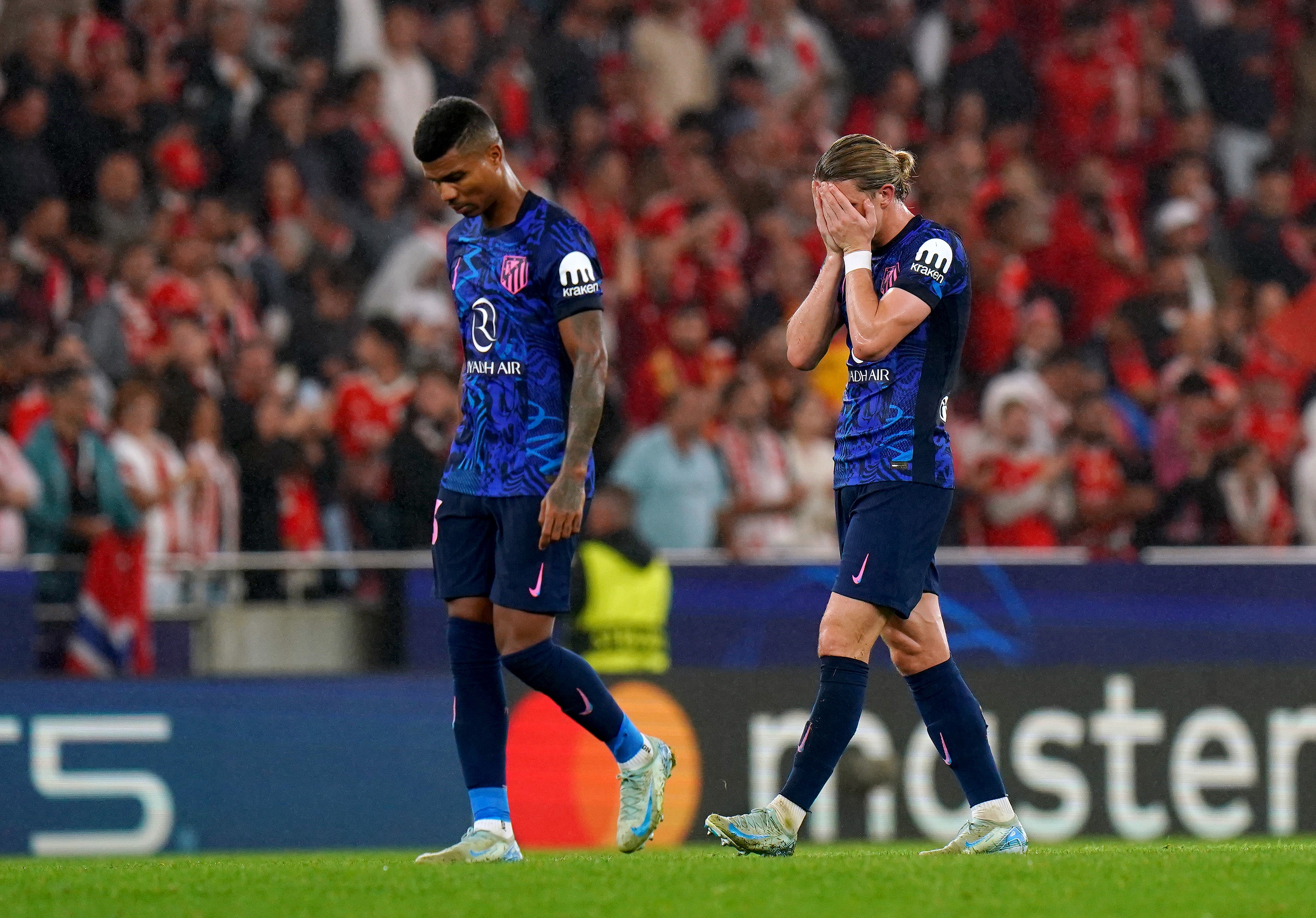 Conor Gallagher hides his face after Atletico concede four in Lisbon