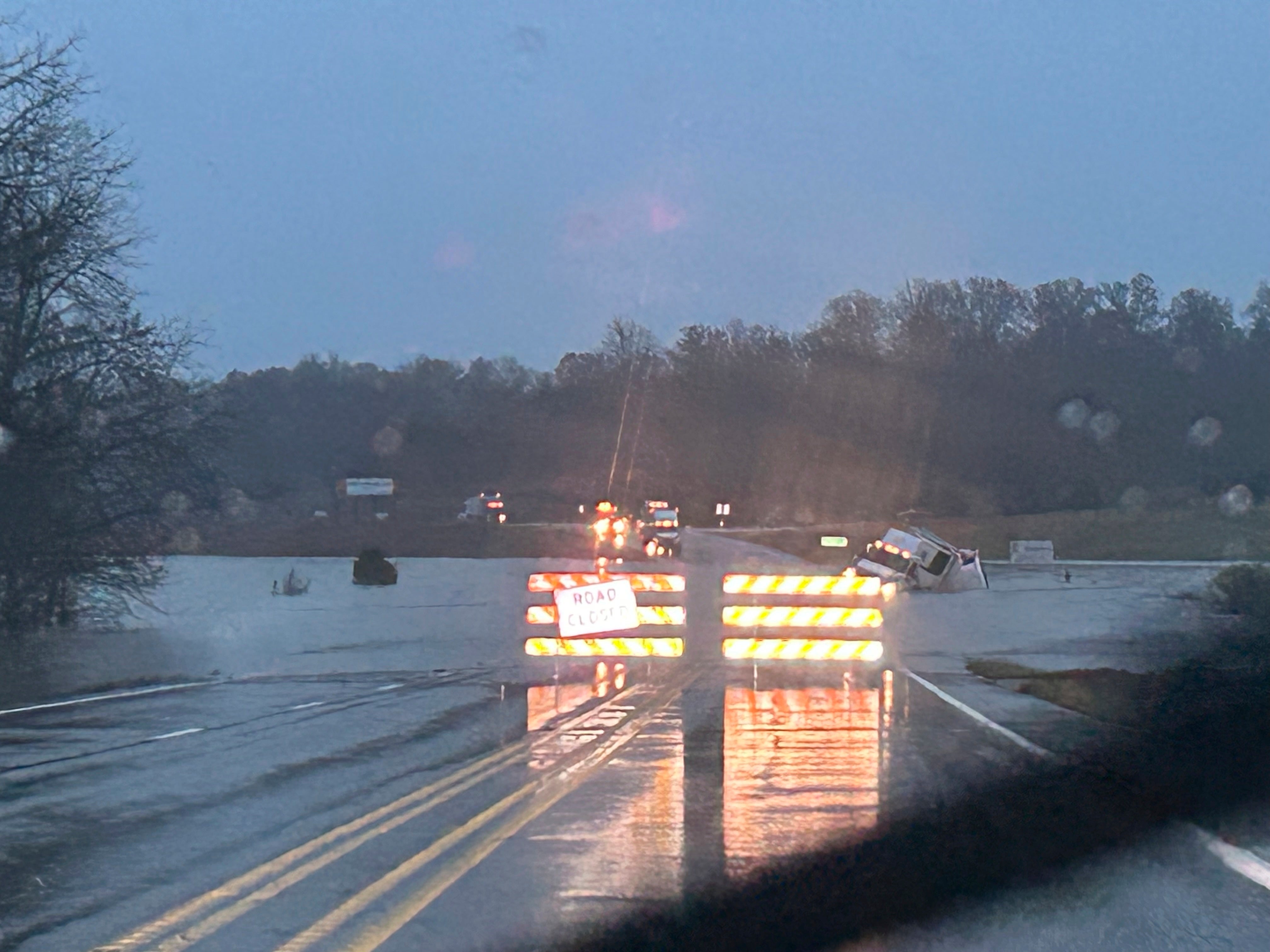 A photo released by the Missouri State Highway Patrol of a tractor trailer sits submerged in flood water